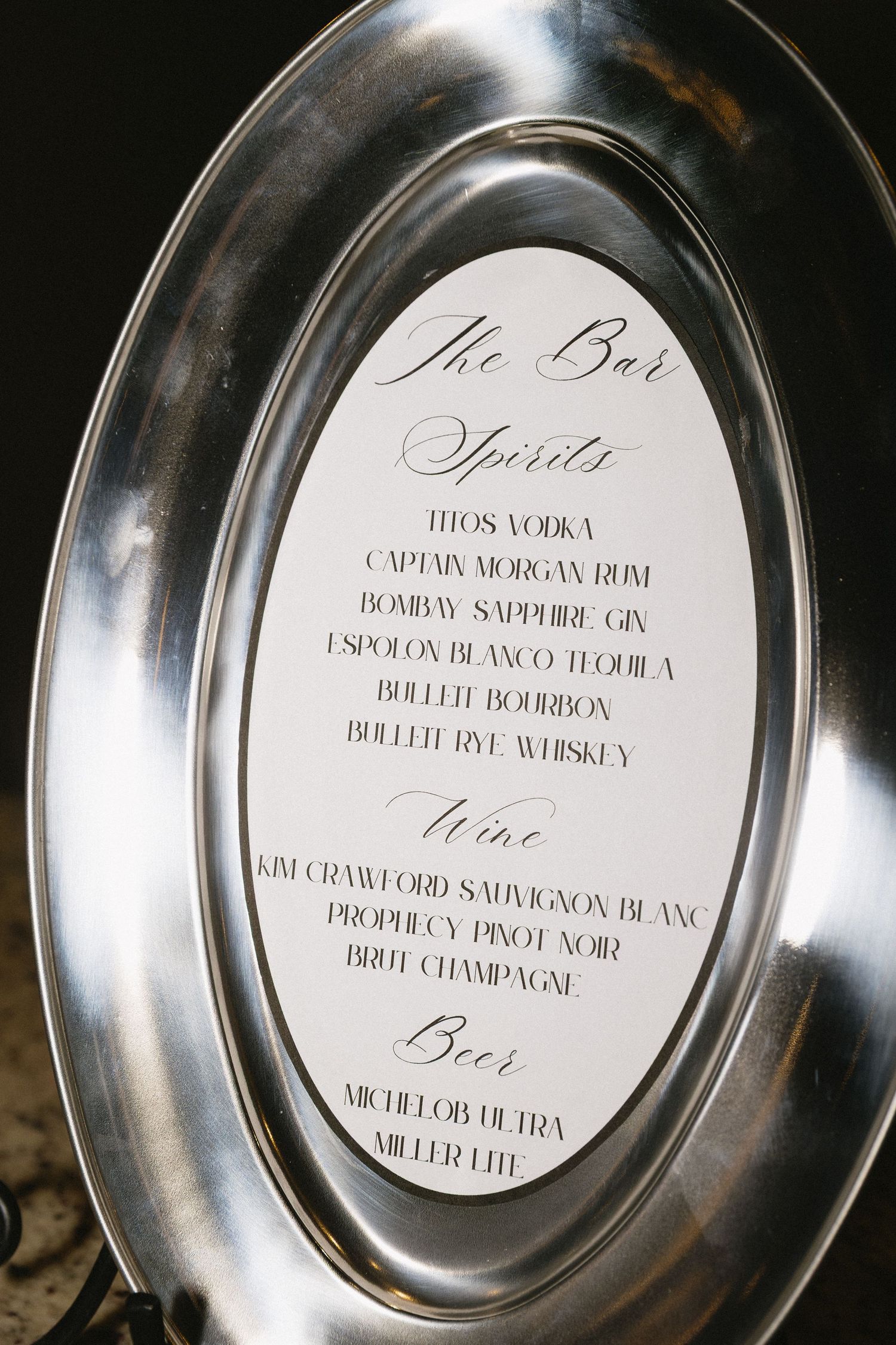 Close-up shots of elegant wine and champagne bottle labels arranged in a sequence.