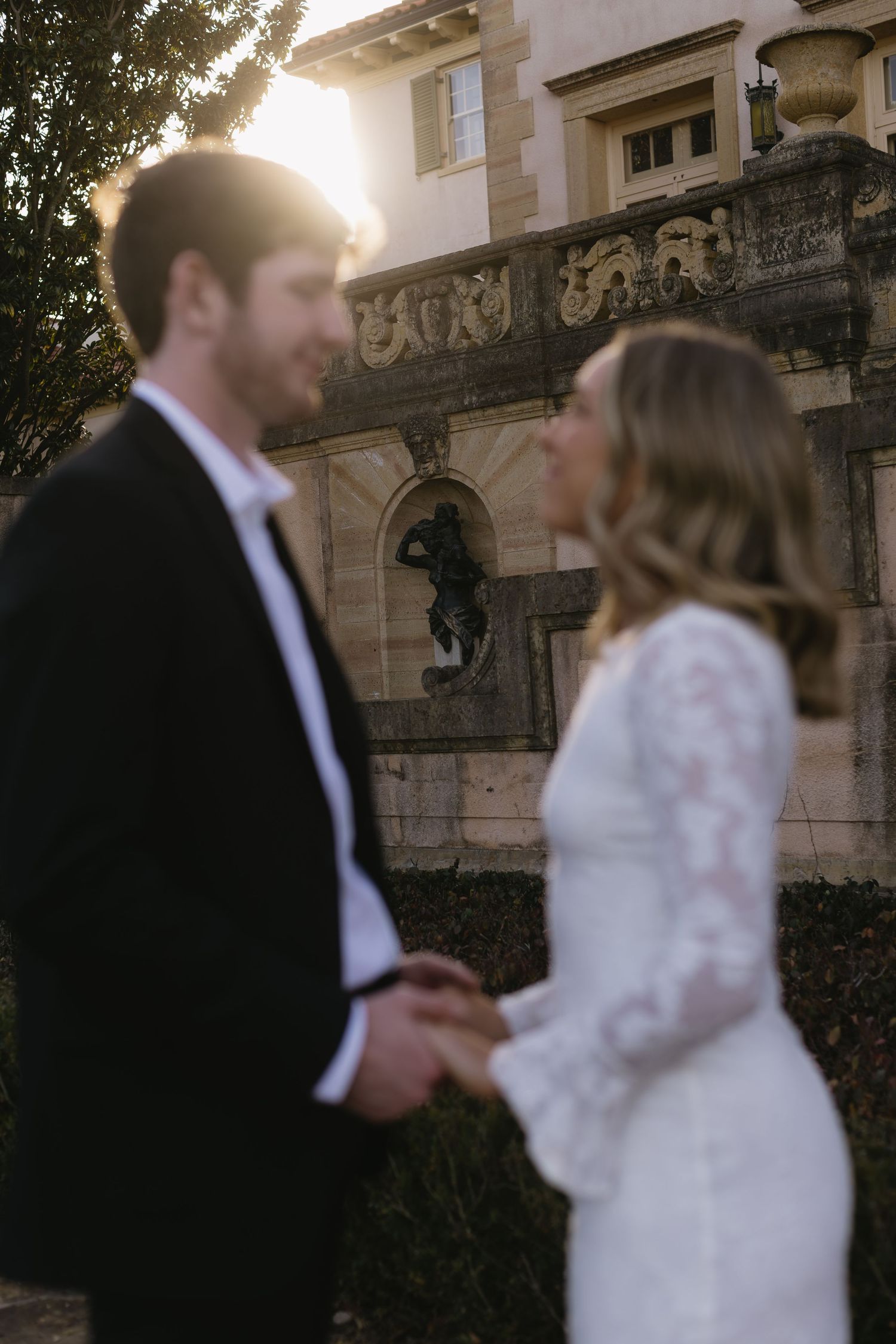 A series of sunset wedding portraits showing a couple in intimate moments against architectural details.
