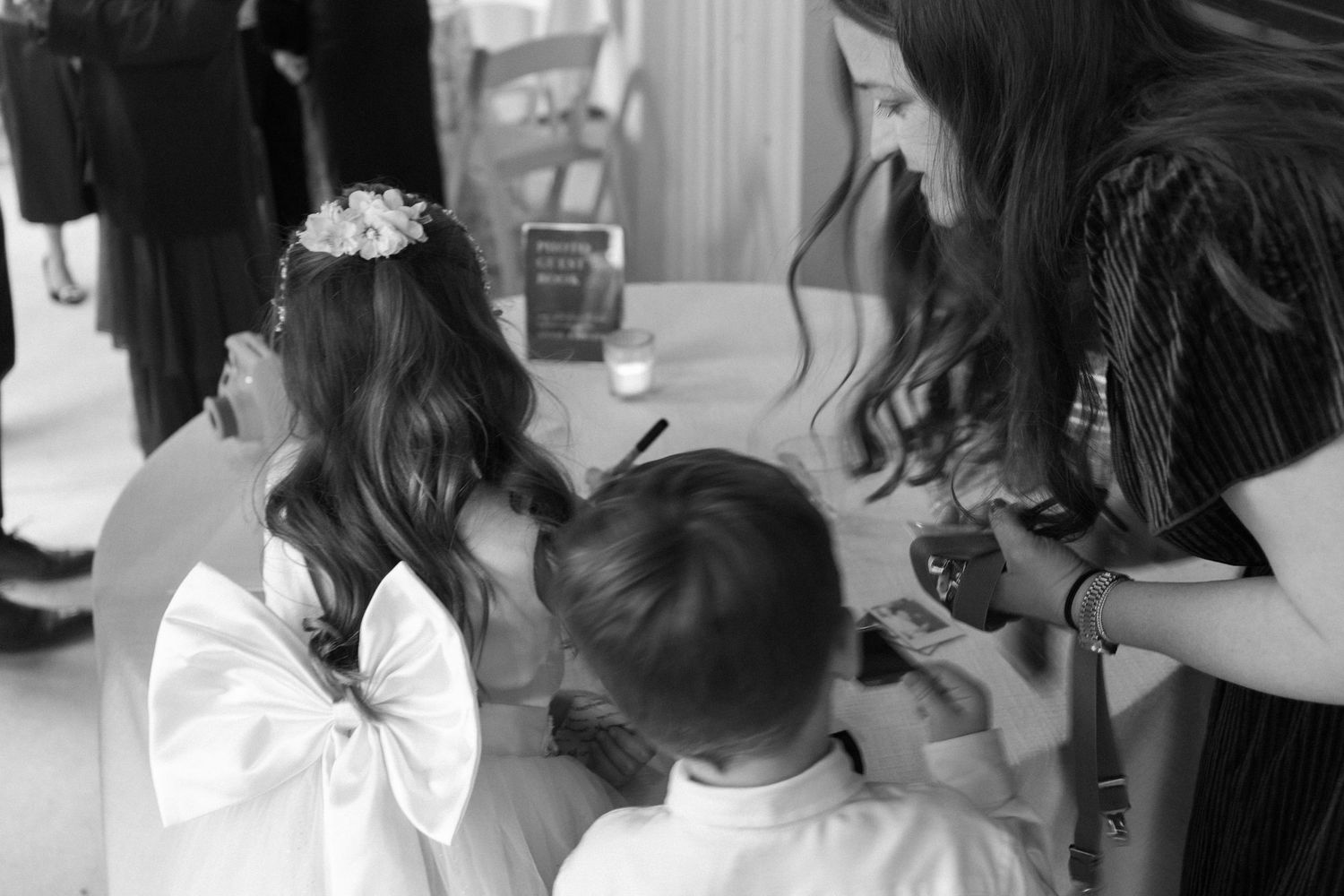 Wedding preparation scene with styling and makeup in progress.
