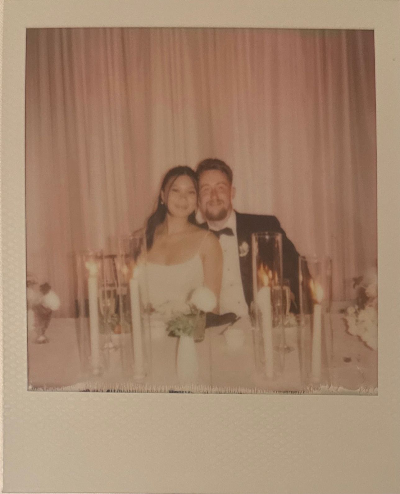 A series of vintage Polaroid photographs showing people seated at a formal dinner table with drinks and place settings.