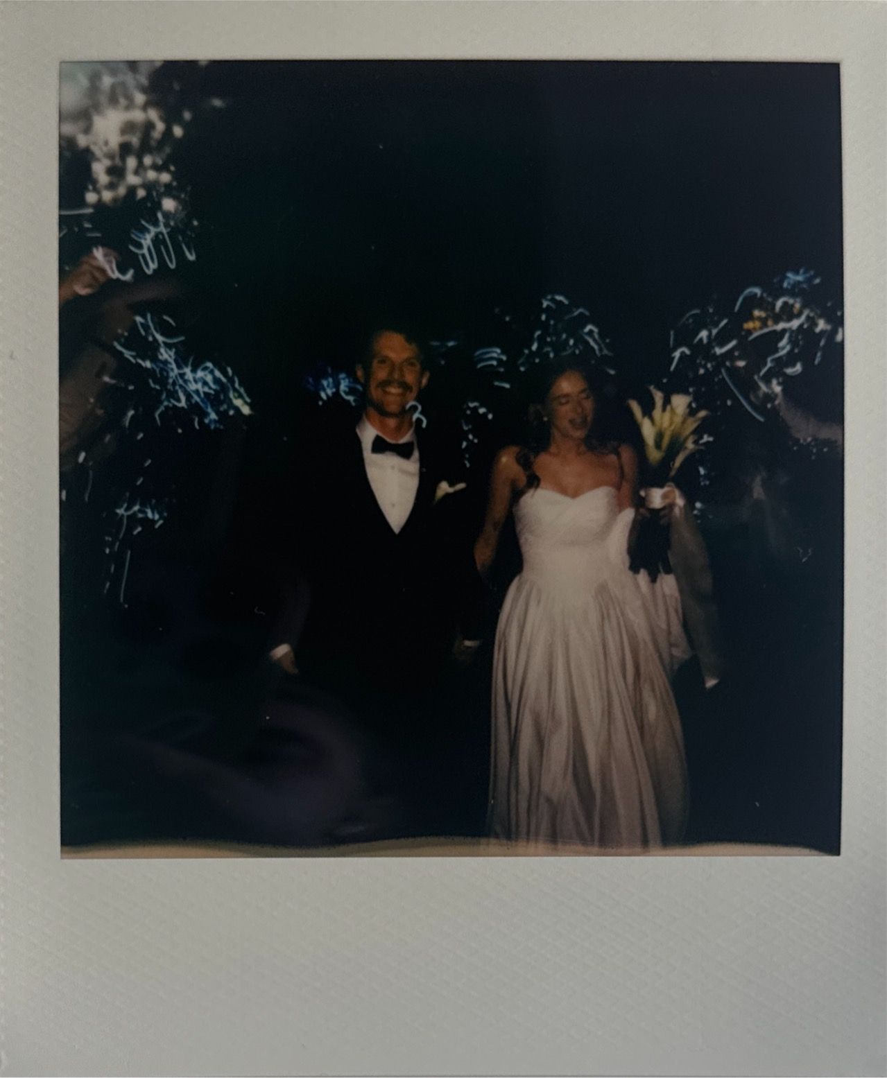 Vintage-style wedding photos displayed on light gray background showing reception moments.
