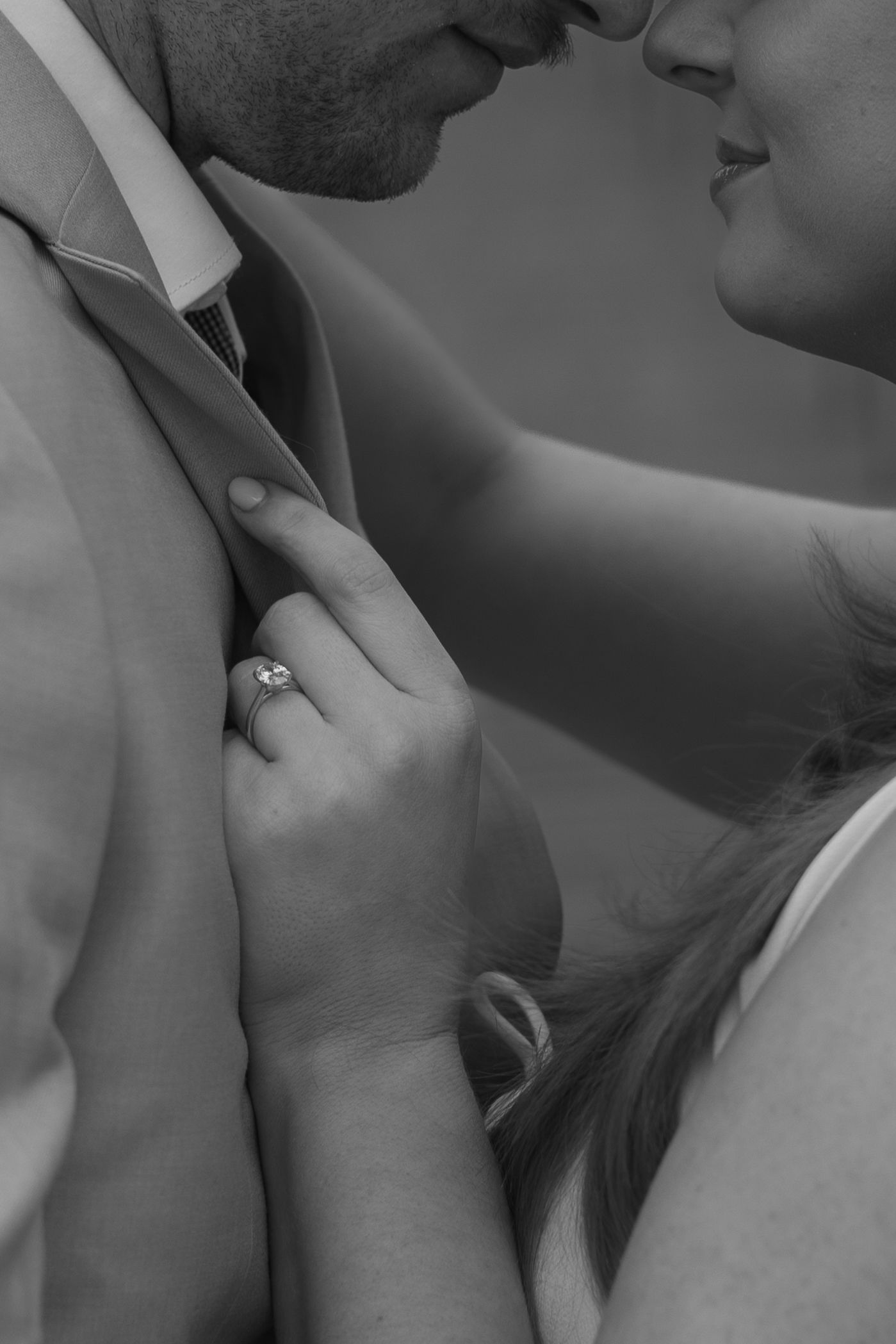 A close-up black and white artistic photo series showing intimate moments between two people.
