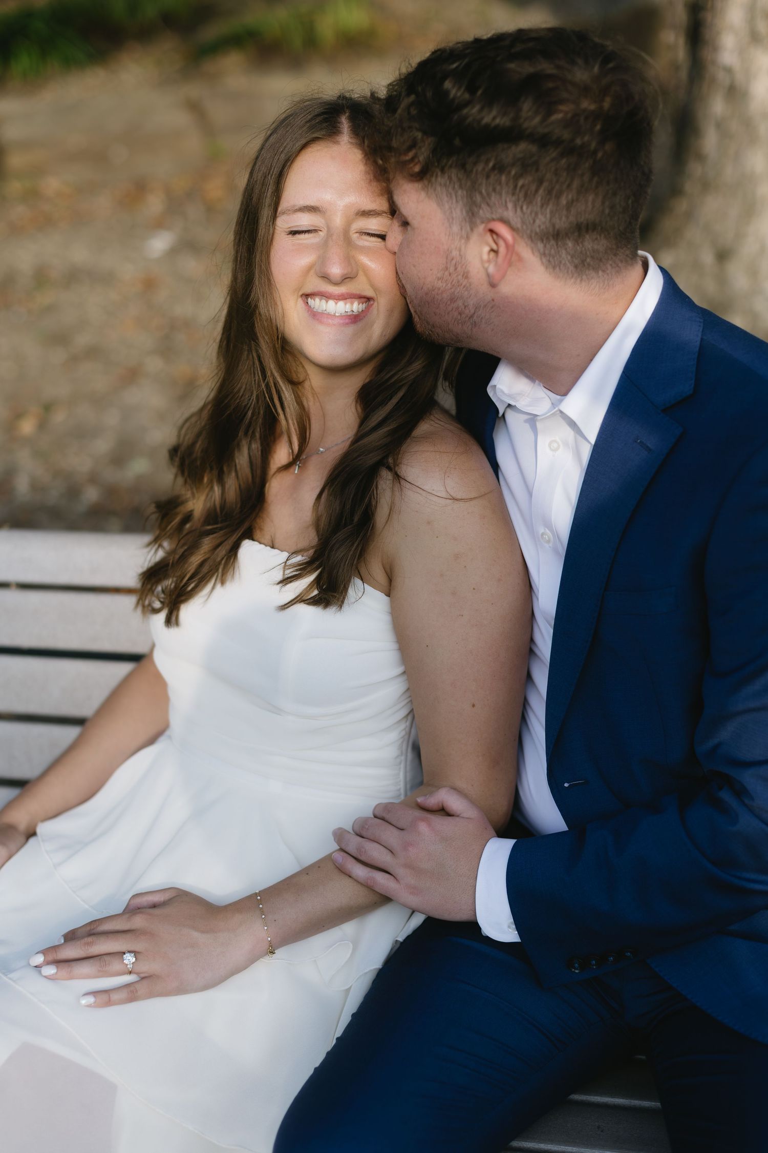 A romantic engagement photography sequence showing a couple sitting together on a bench.