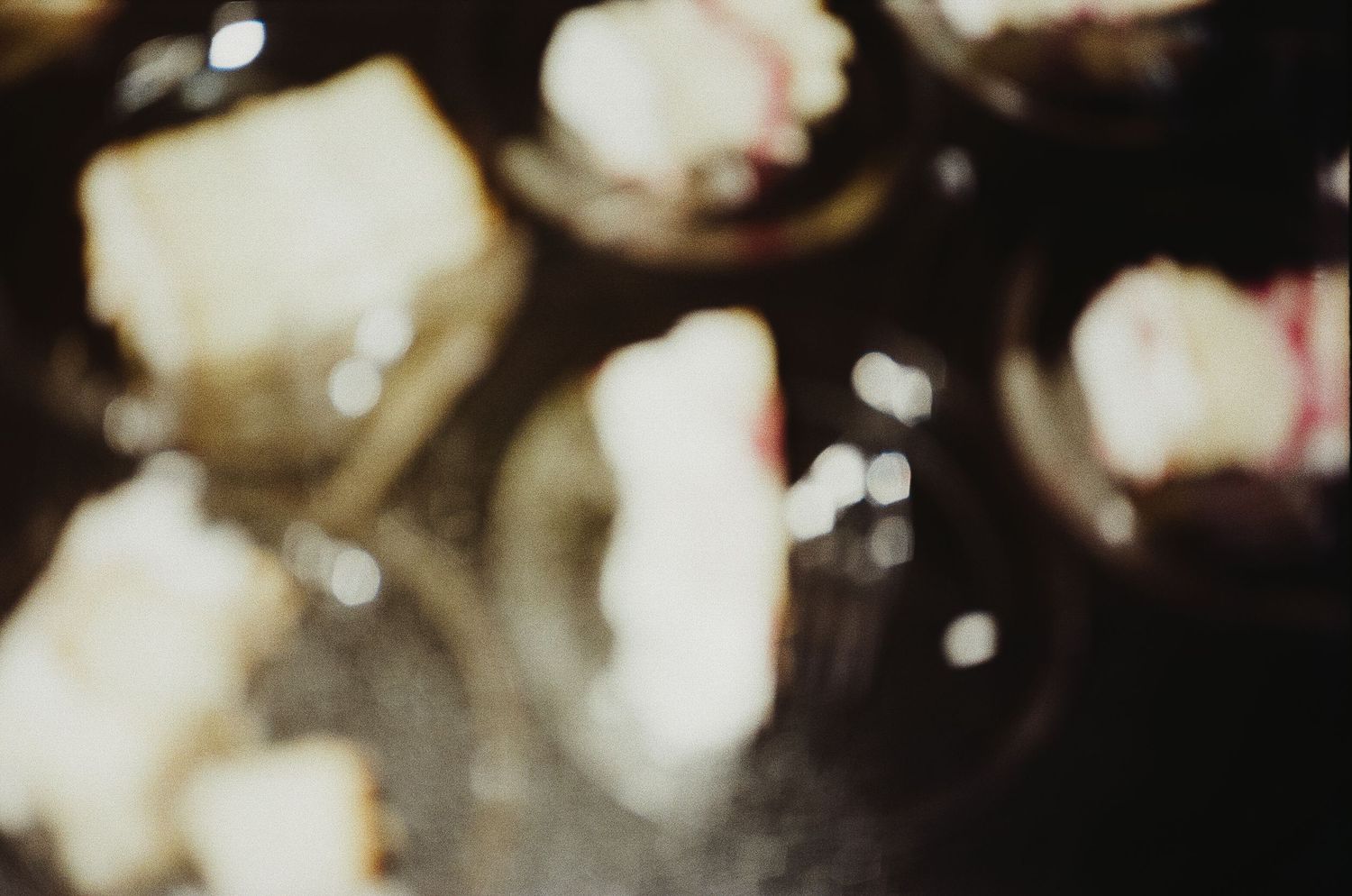 Abstract blurred bokeh lights creating a dreamy atmospheric background.