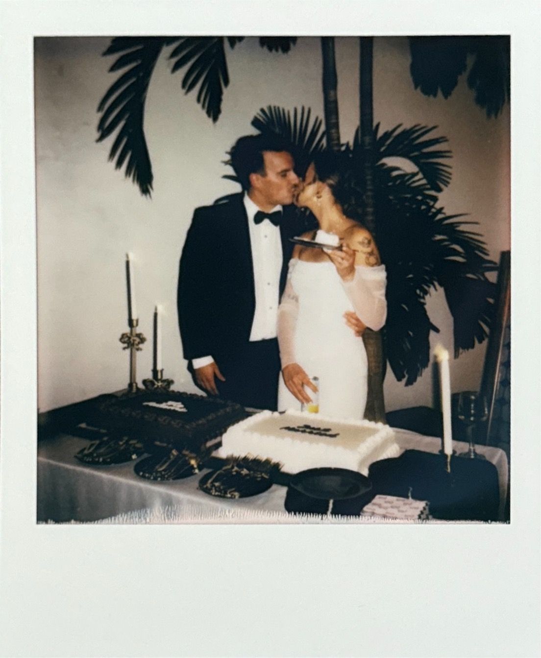 Vintage-style polaroid photos of a wedding reception with palm decor.