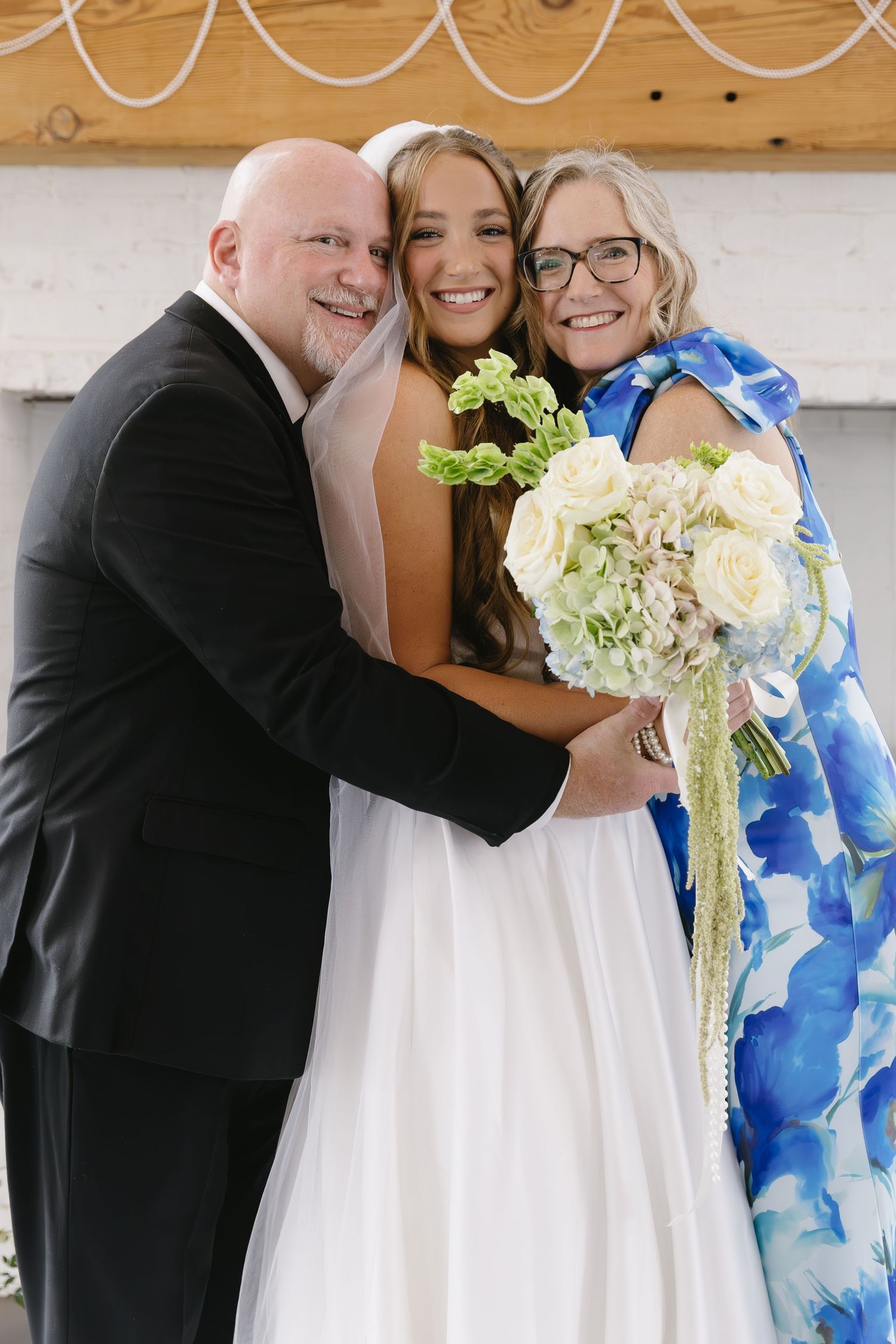 Wedding photos showing celebratory moments with guests in formal attire.