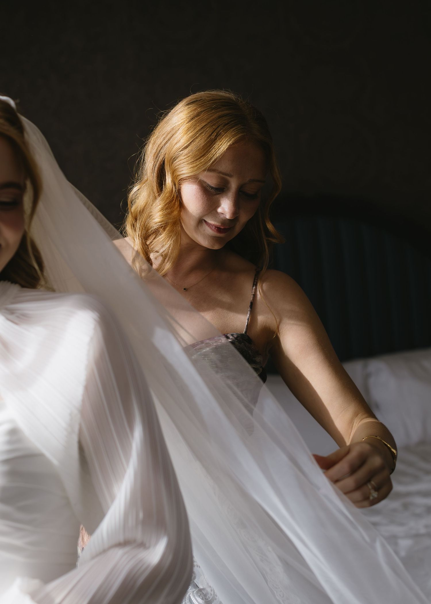 Artistic series of bridal portraits showing movement in white wedding dress.