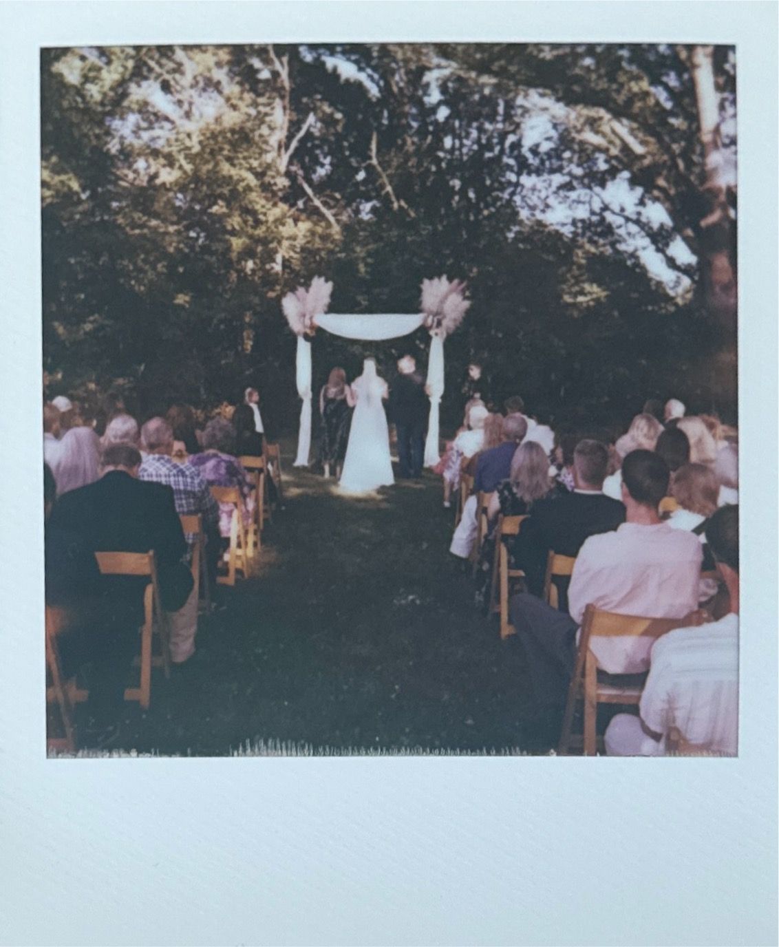 Vintage-style polaroid photos capturing moments from an outdoor wedding ceremony.