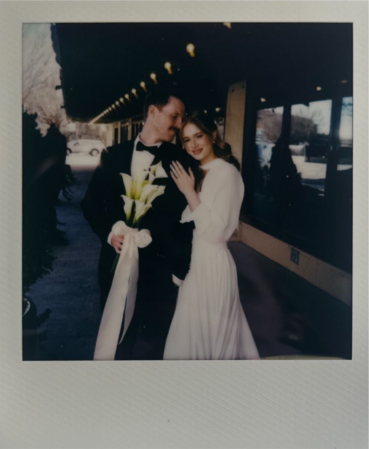 Vintage-style wedding photos showing romantic moments in an outdoor setting.