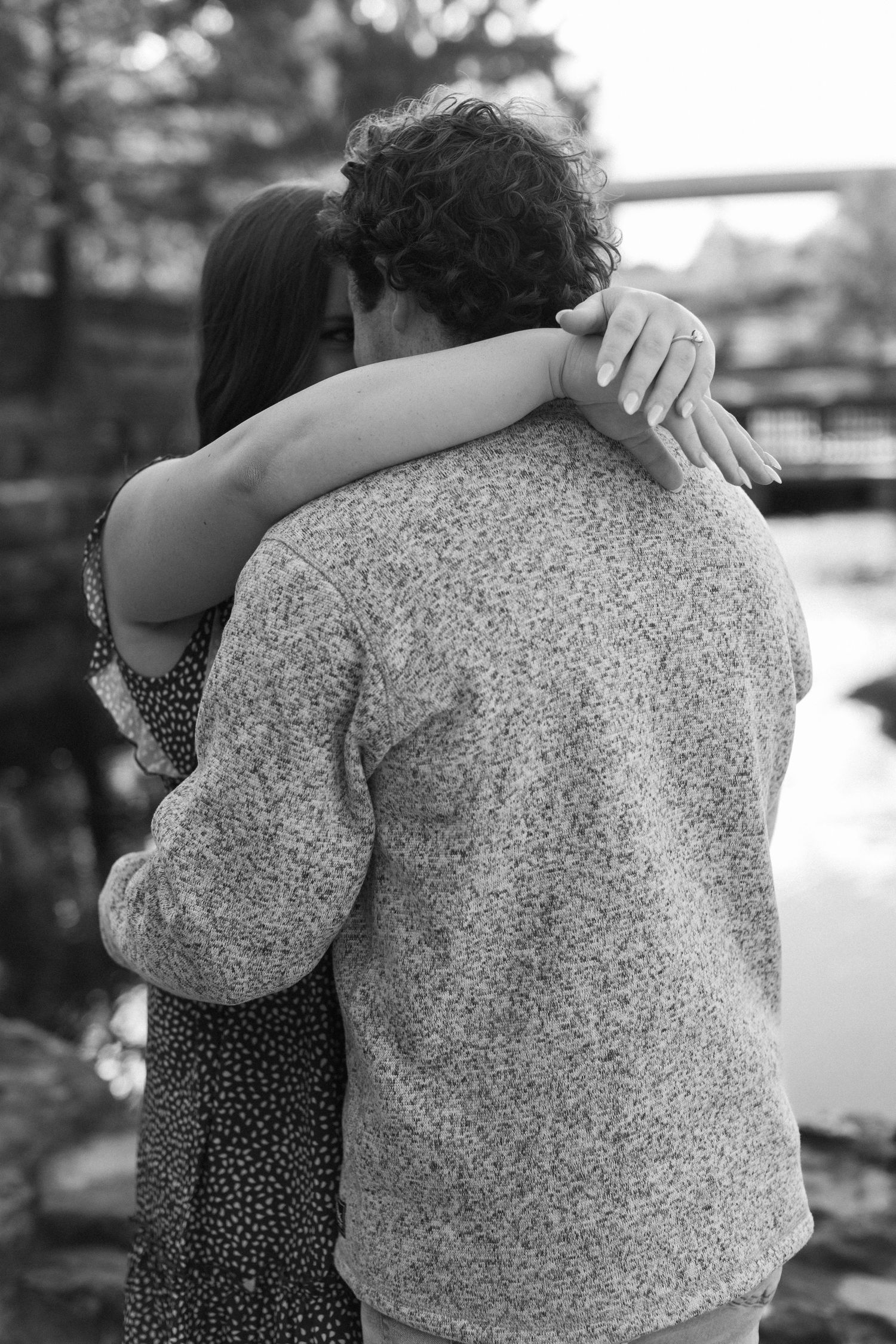 Black and white series showing close embraces and tender moments between couple.