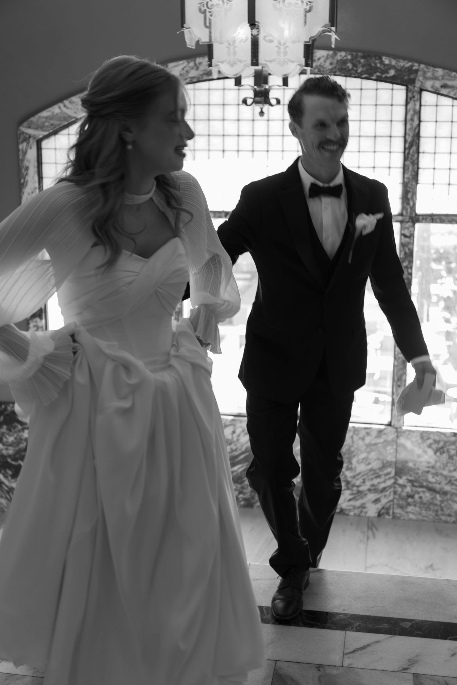 A bride in a flowing white gown and groom in black tuxedo pose together in a sequence of artistic frames.
