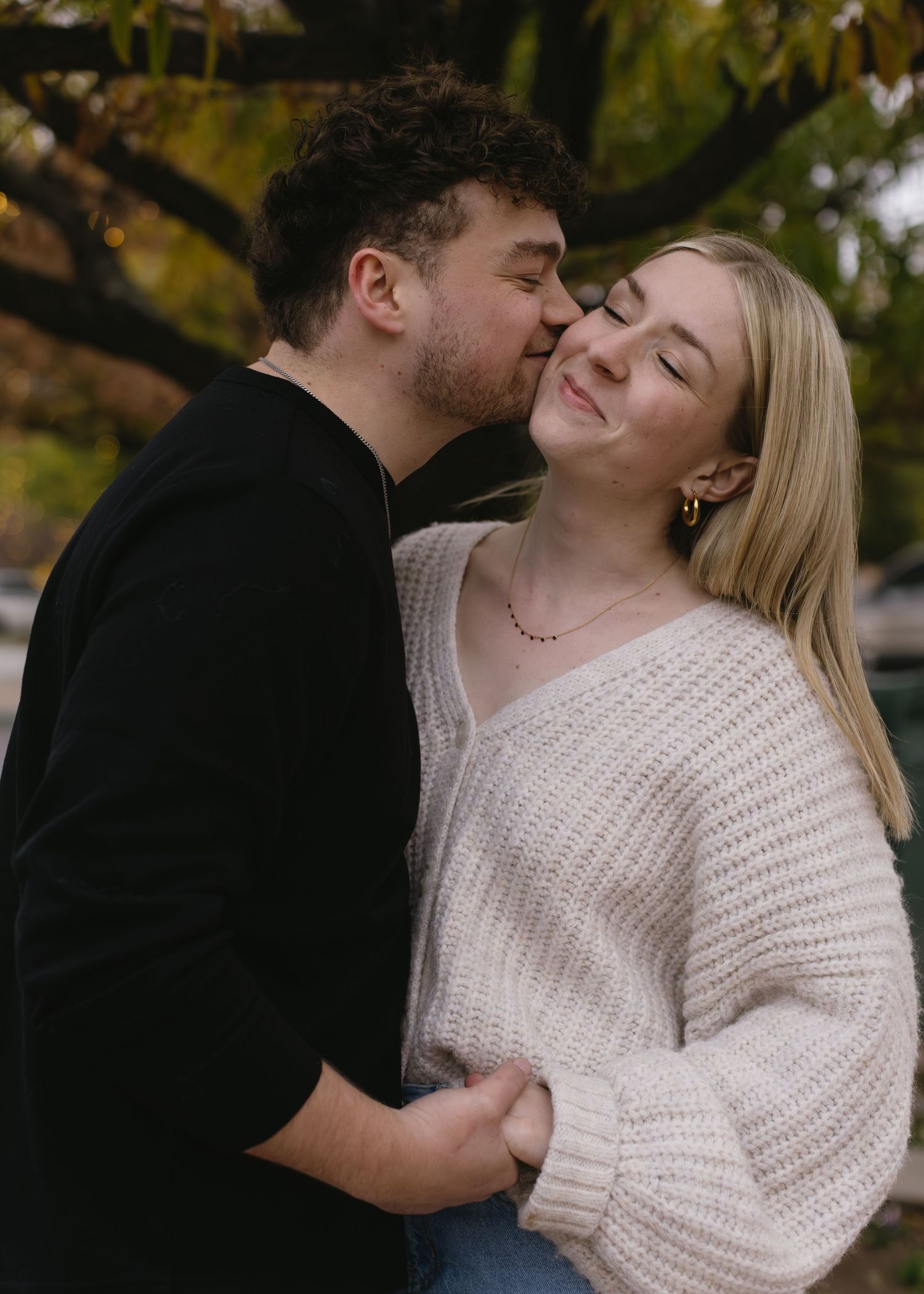 A romantic photoshoot sequence captured against autumn foliage.