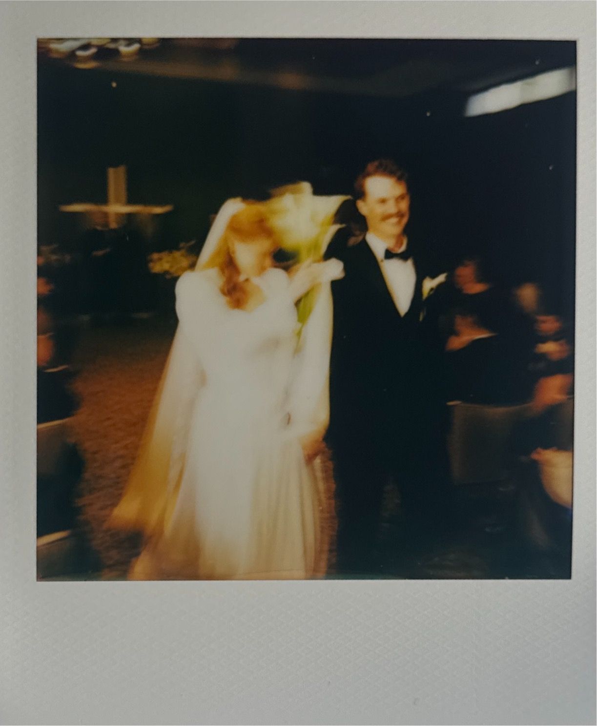 Vintage-style polaroid wedding photos showing reception celebration moments.