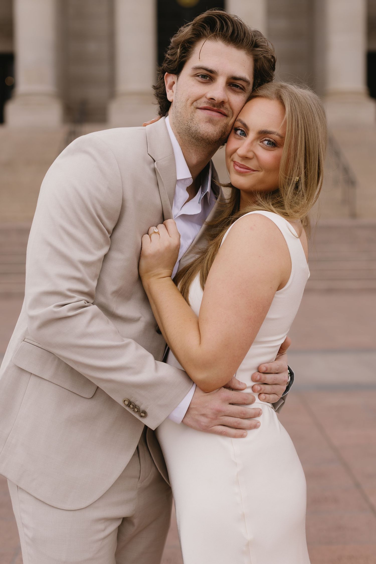 A romantic series of candid moments between a couple in formal attire against a classical architecture backdrop.