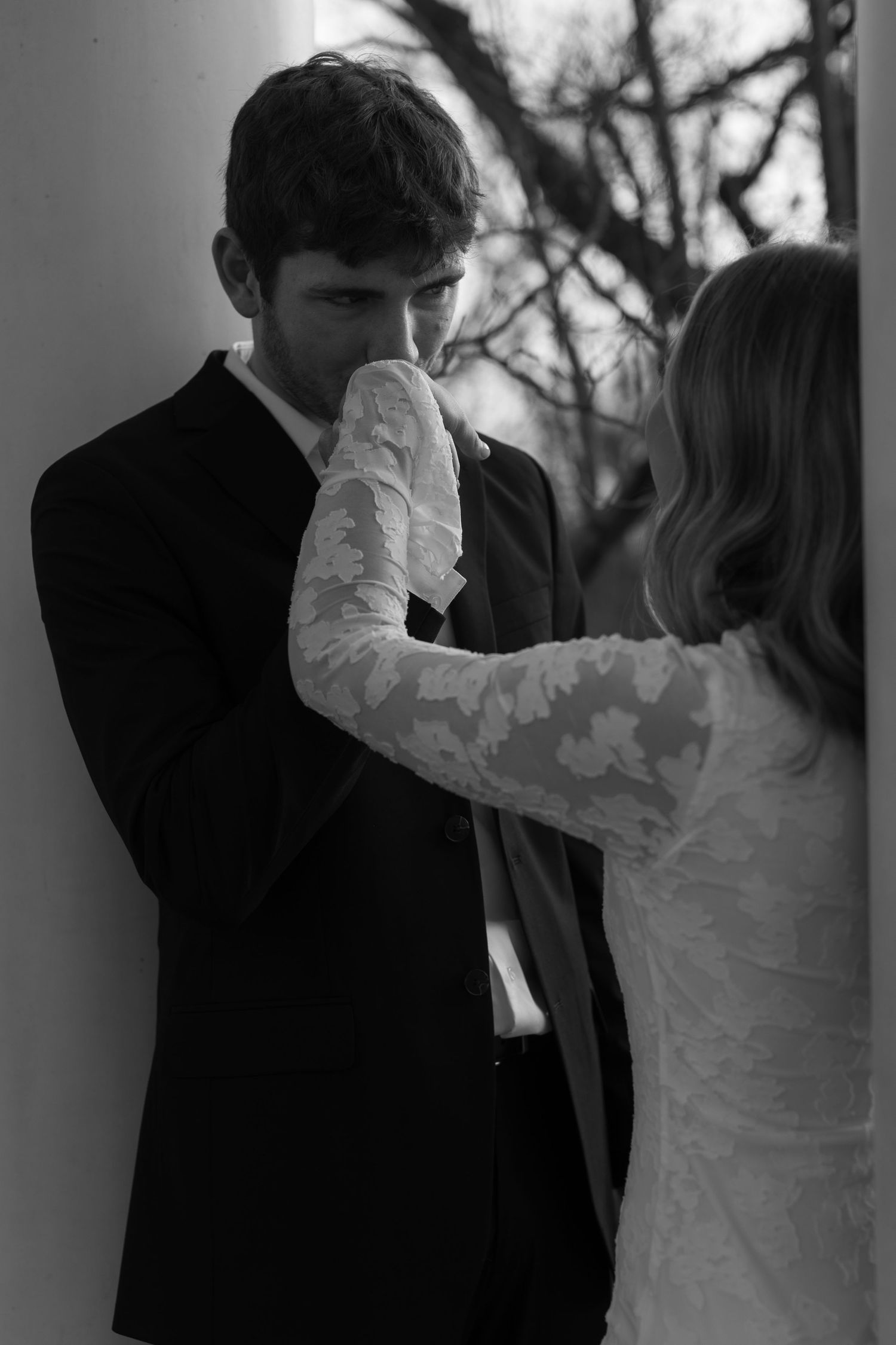Black and white photo of a couple dancing together in an intimate moment.