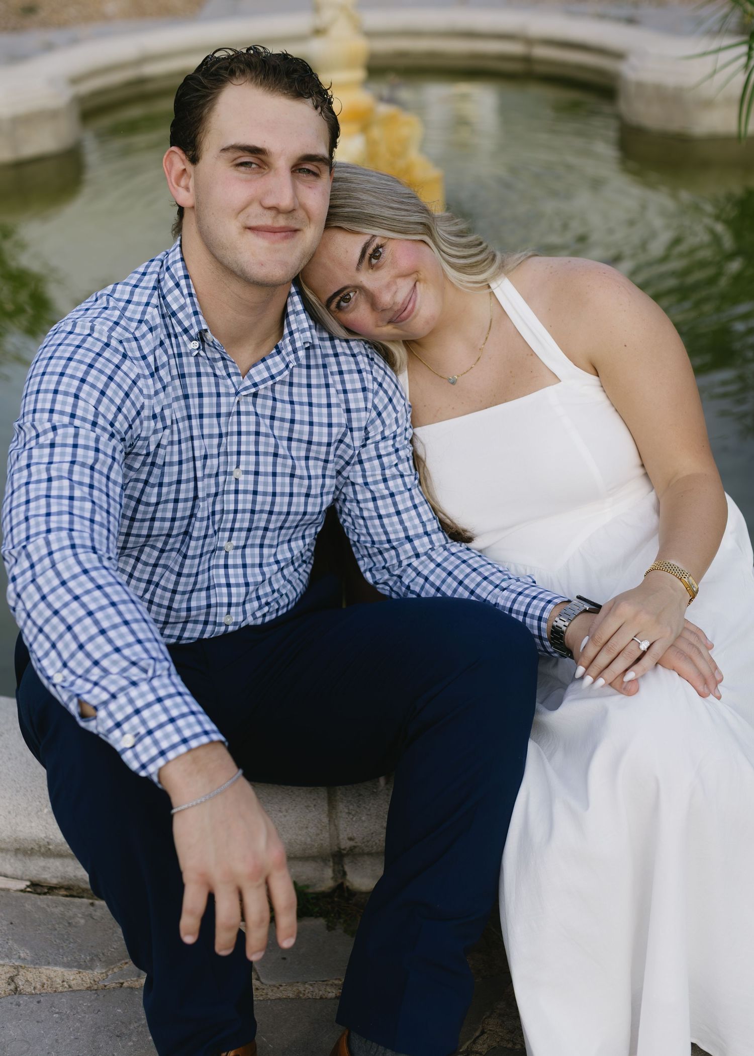 A couple in formal attire sit close together on stone steps outside, with the composition repeated in multiple frames.