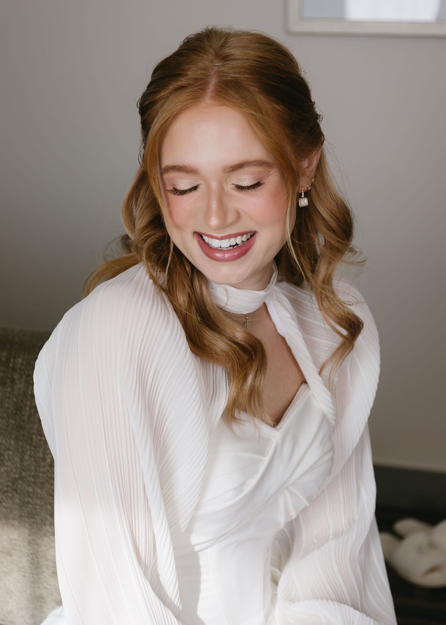 Close-up shots of a white bridal collar and neckline details in natural window light.