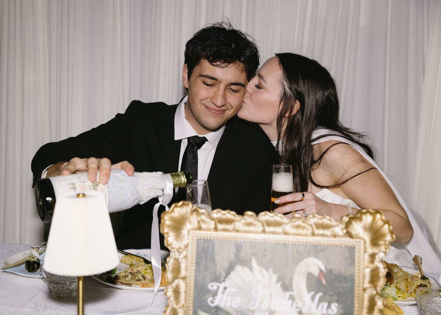 A collection of vintage wedding reception photos showing couples at tables with cakes and decorations.