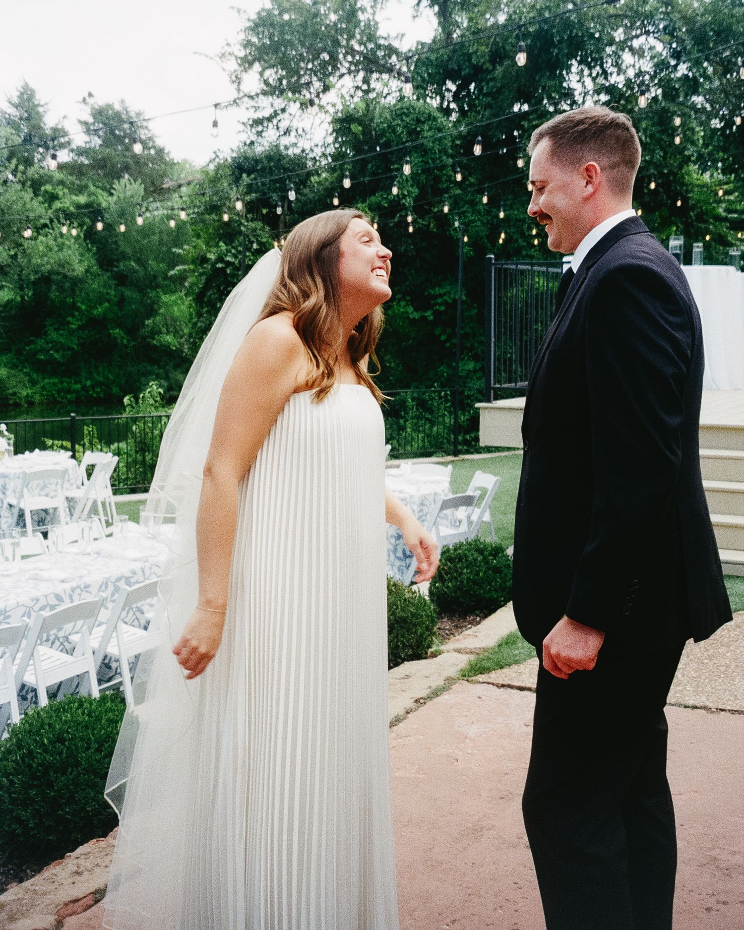 A romantic sequence of outdoor wedding photos with a couple in black and white attire in a garden setting.