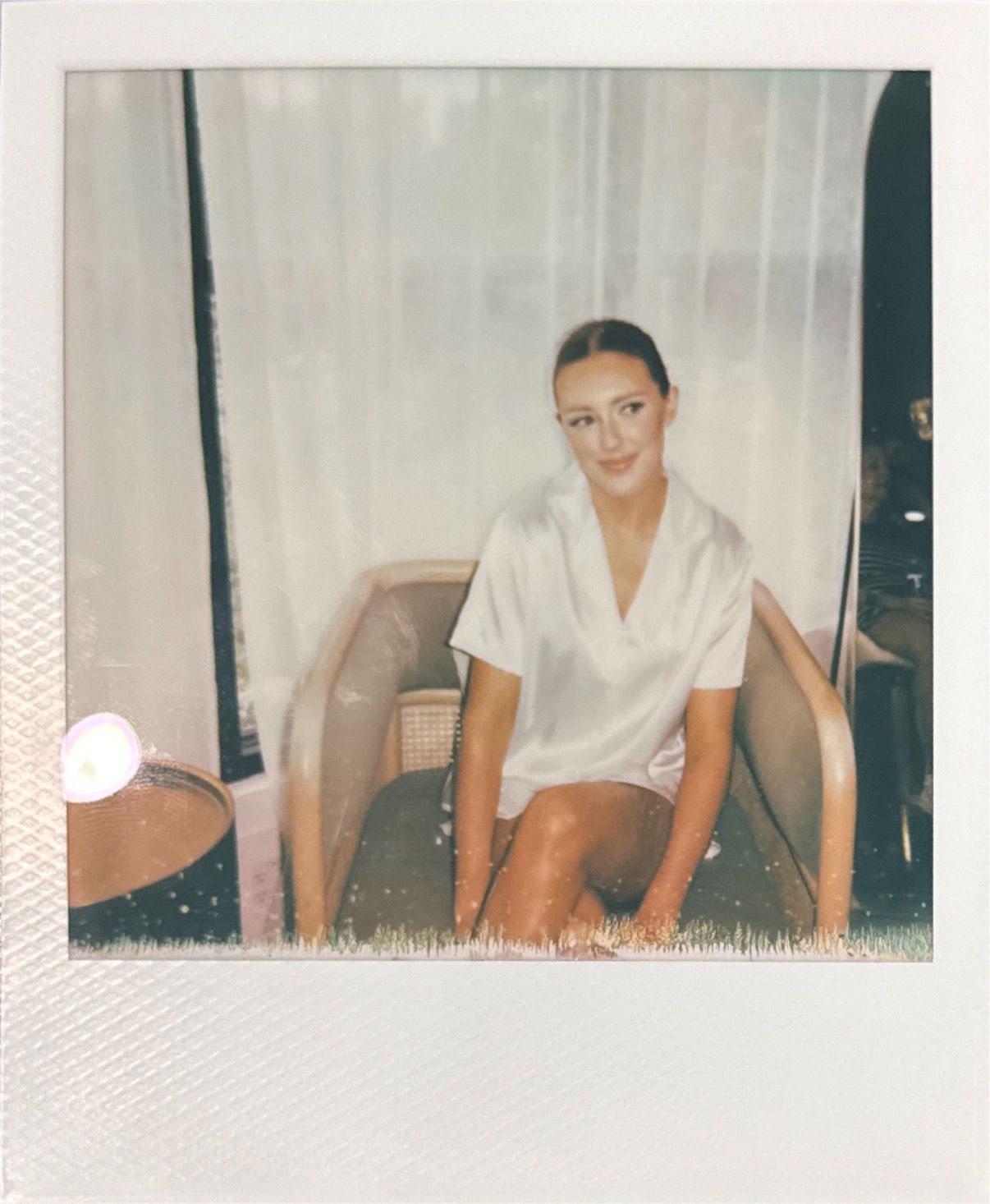 A vintage-style polaroid photo showing preparations before a special event.
