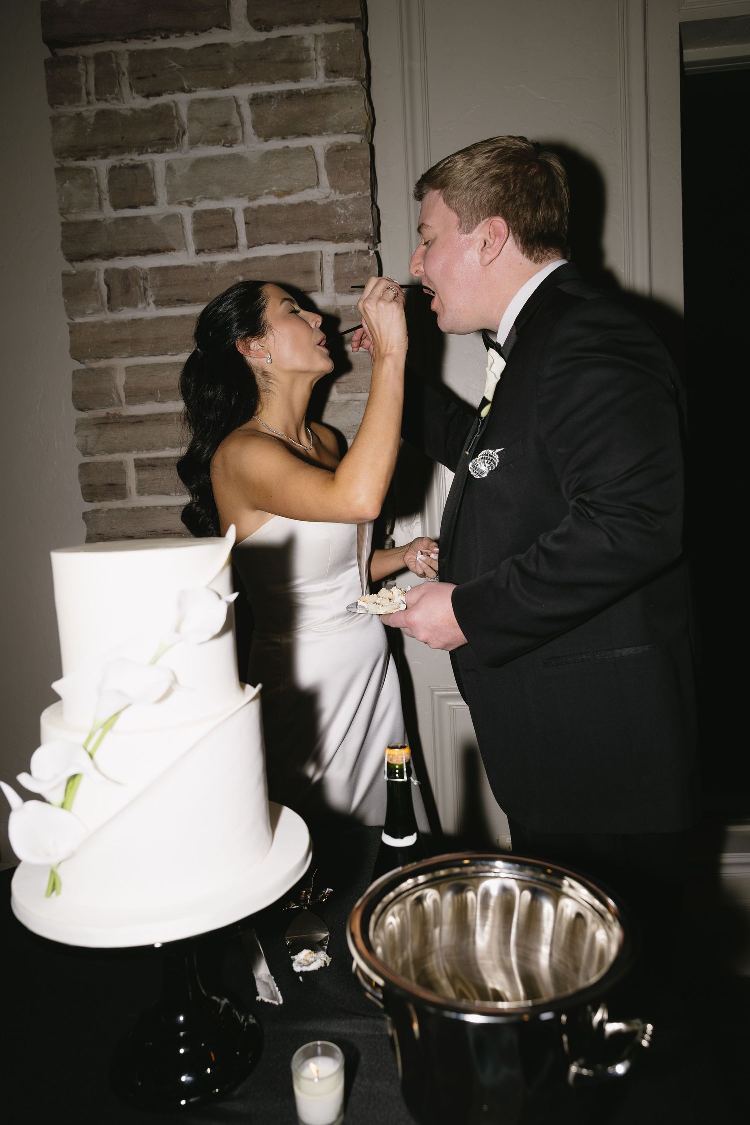 A sequence of wedding cake cutting photos showing the traditional champagne toast moment at a reception.