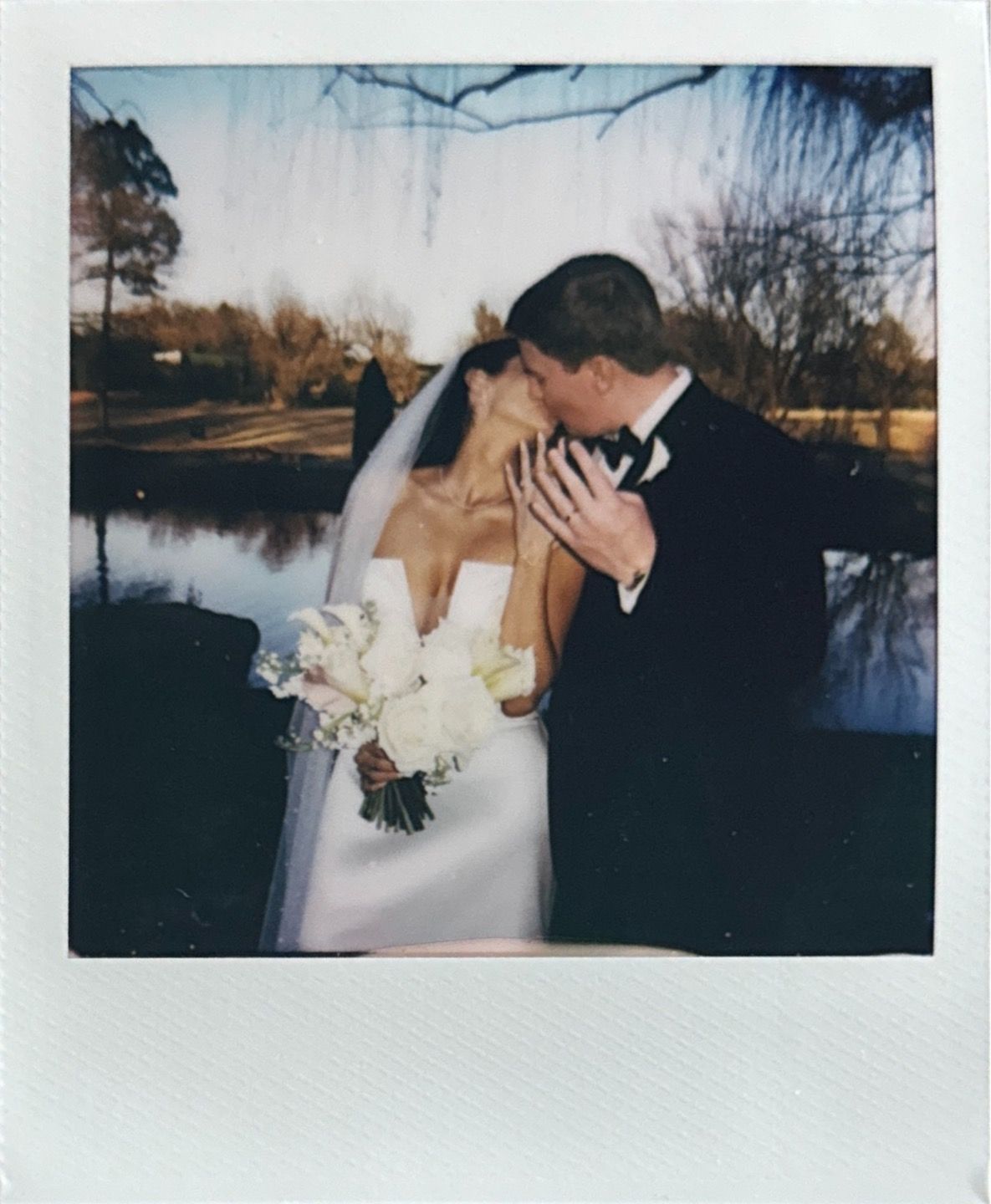 Series of polaroid photos capturing romantic moments by a lake at sunset.