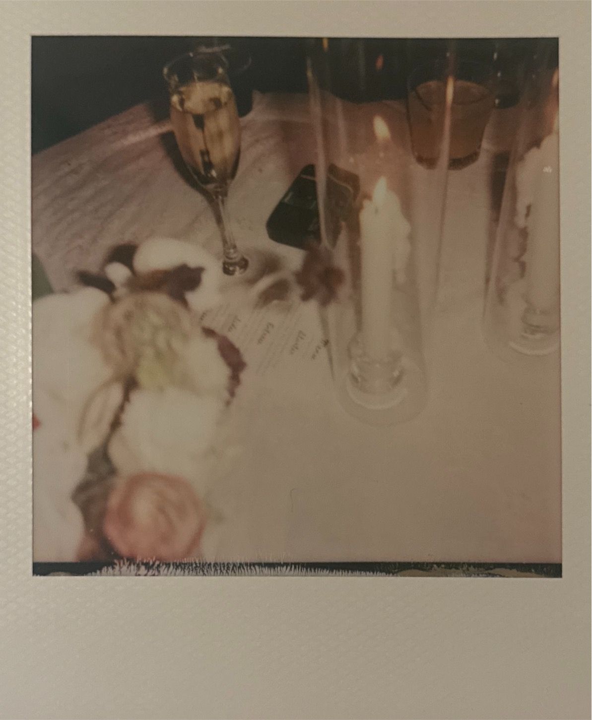 A series of abstract blurry photographs with muted beige and brown tones arranged in a horizontal layout.