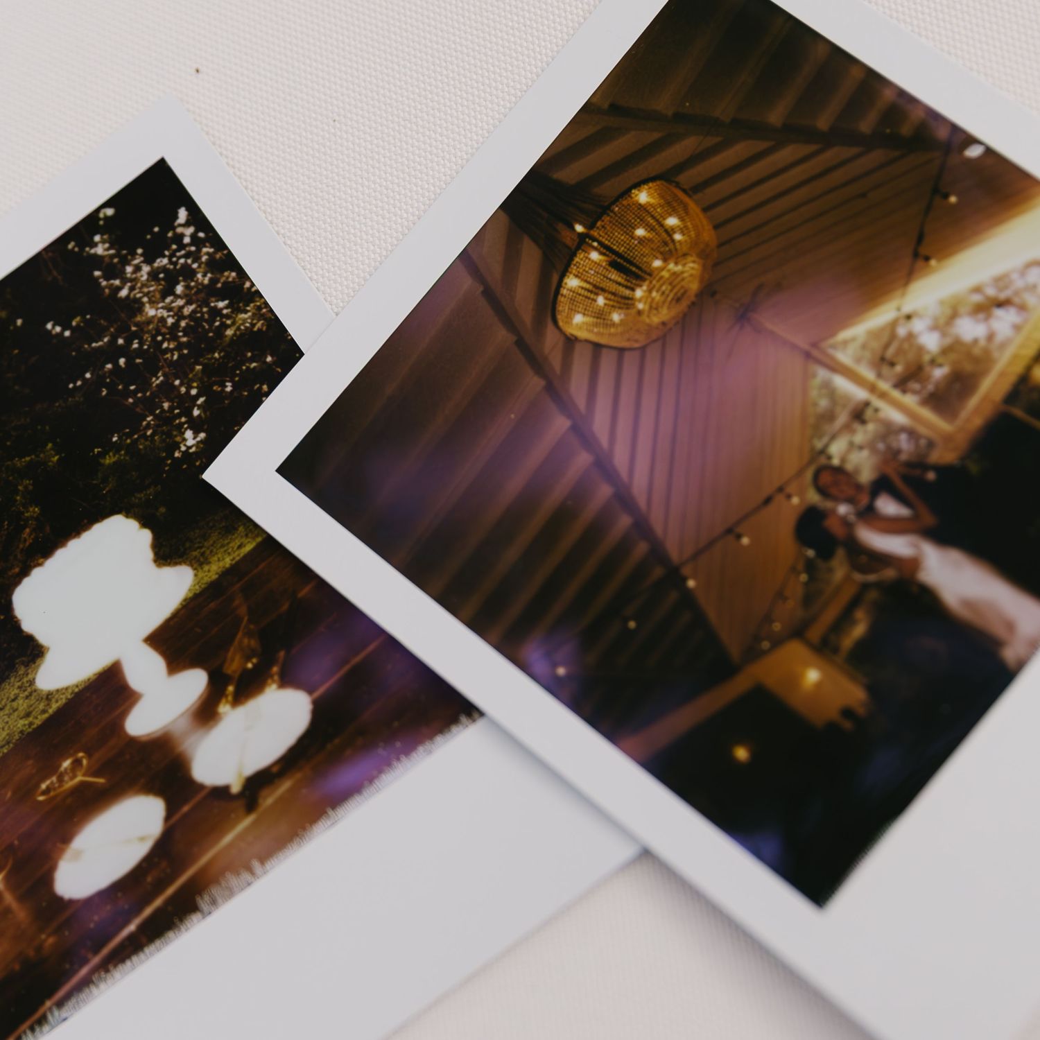 A collection of vintage-style polaroid photos arranged in a row showing wedding reception moments.