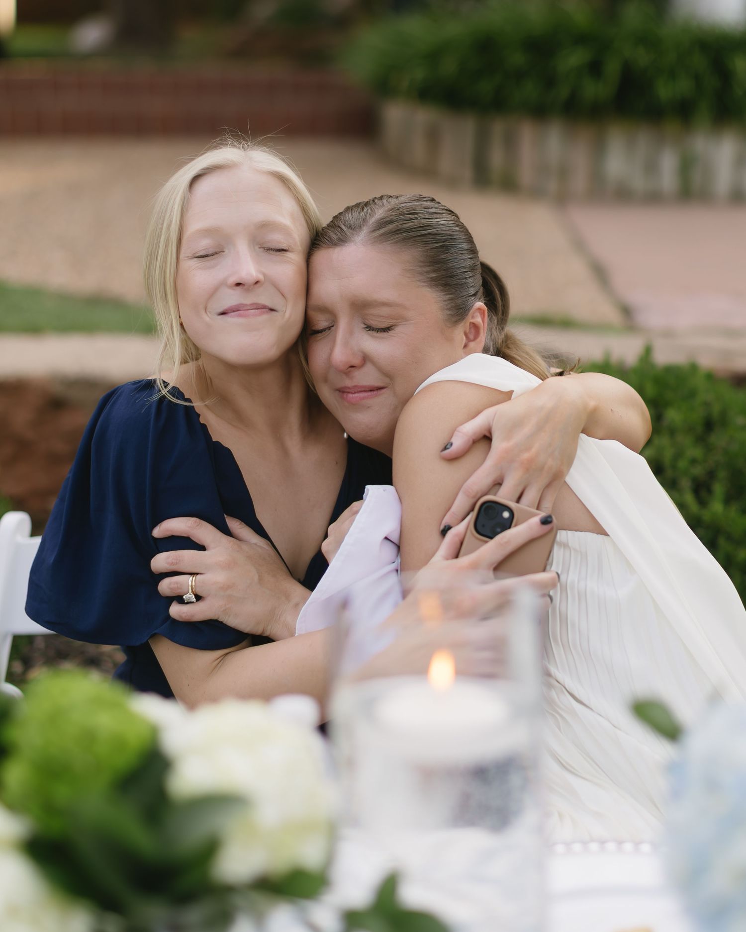 Emotional wedding moment captured in a sequence of candid photos outdoors.
