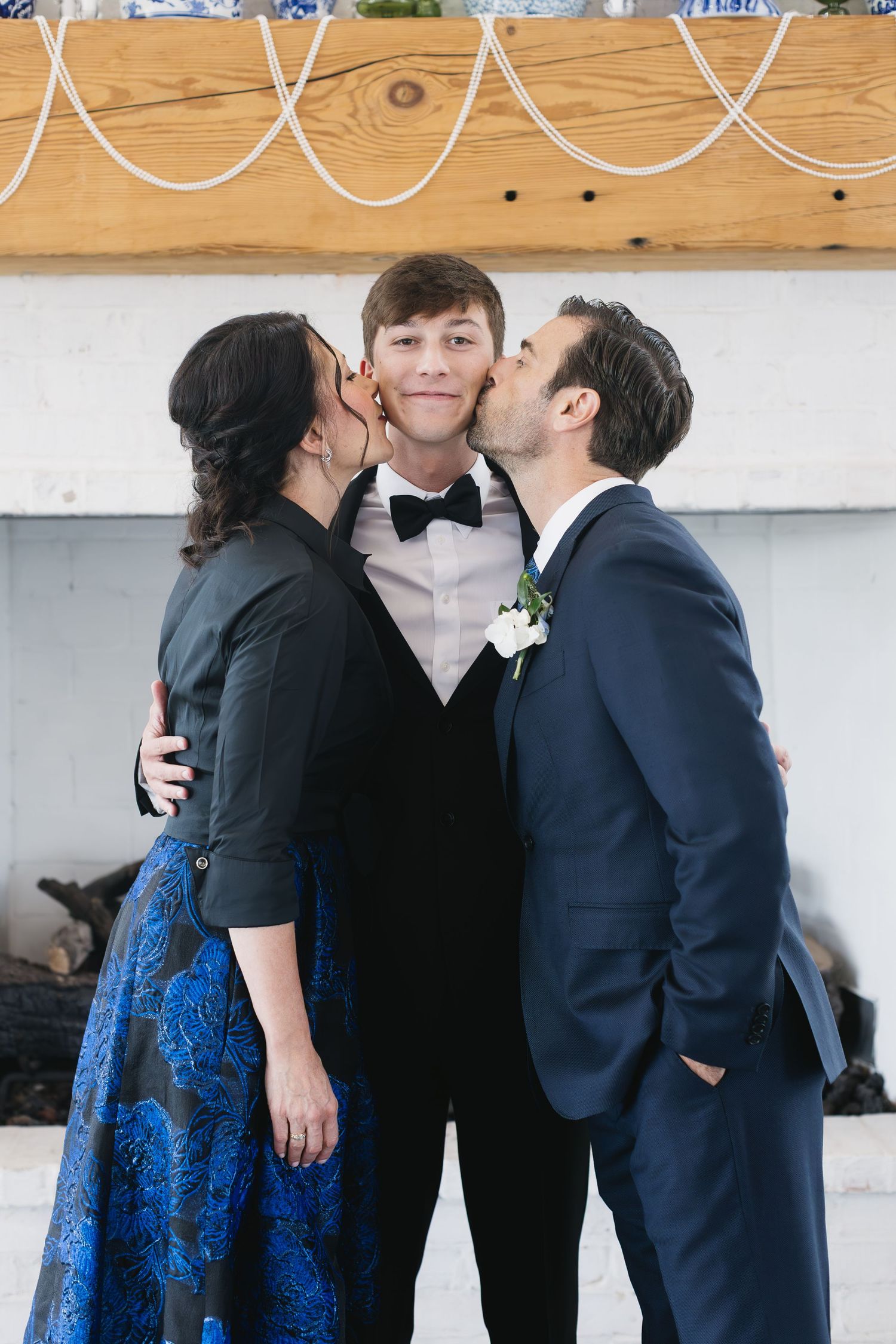 Wedding celebration moment captured with guests in formal attire.