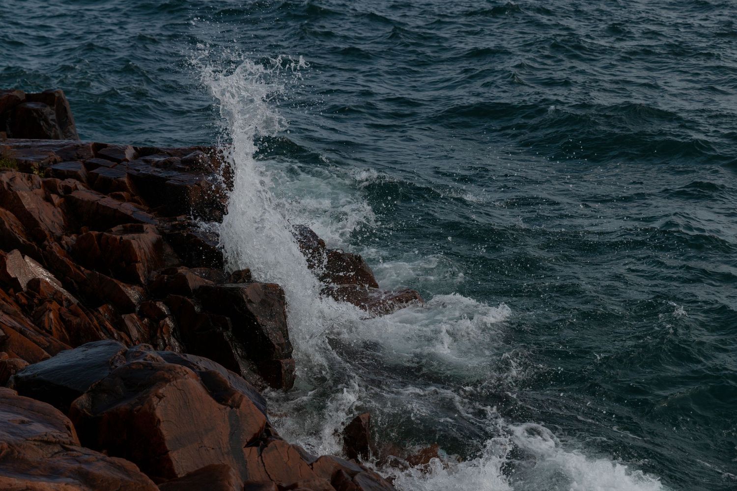 Wave crashing into rocks in Killarney, Ontario