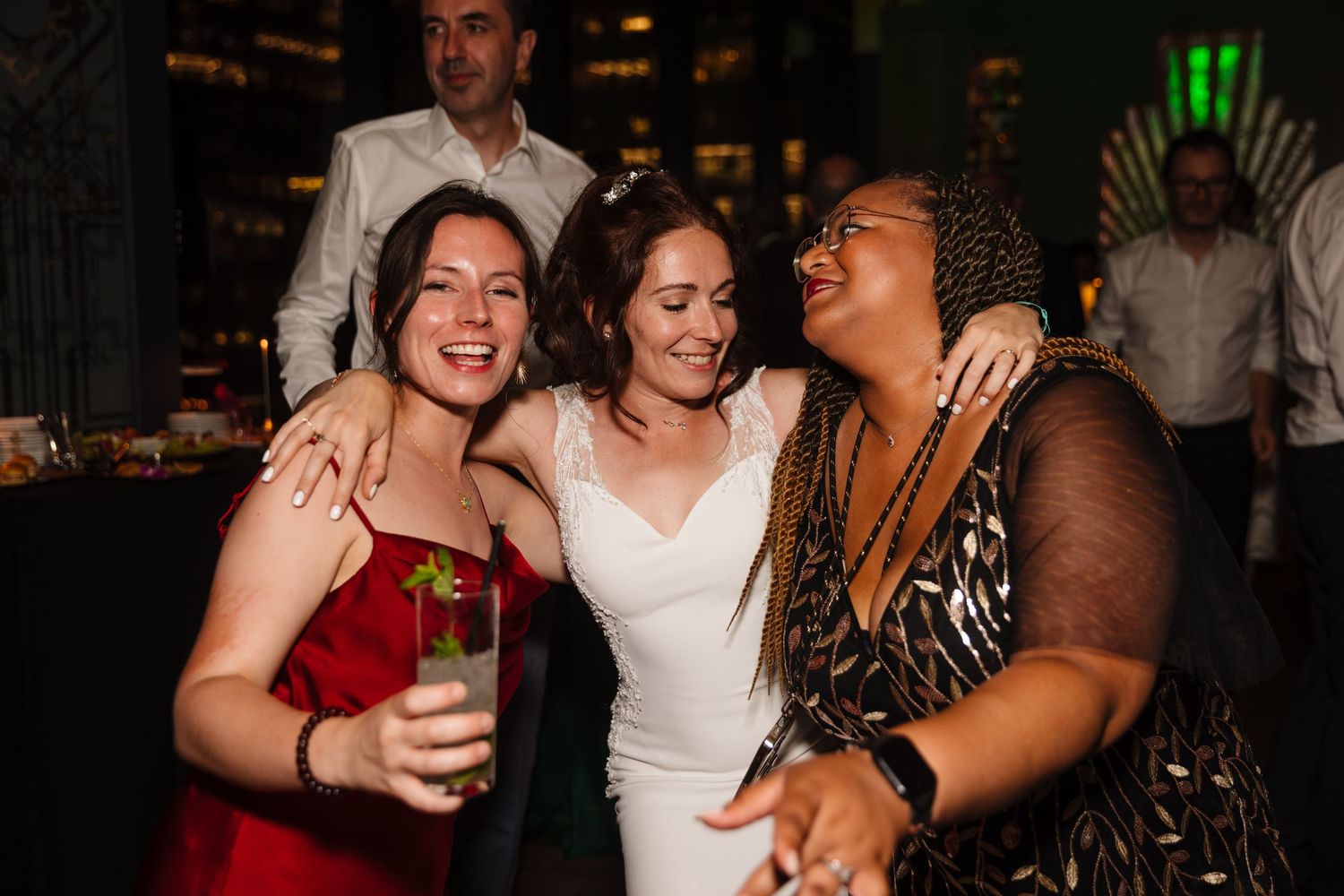 Wedding reception dance floor filled with celebrating guests.
