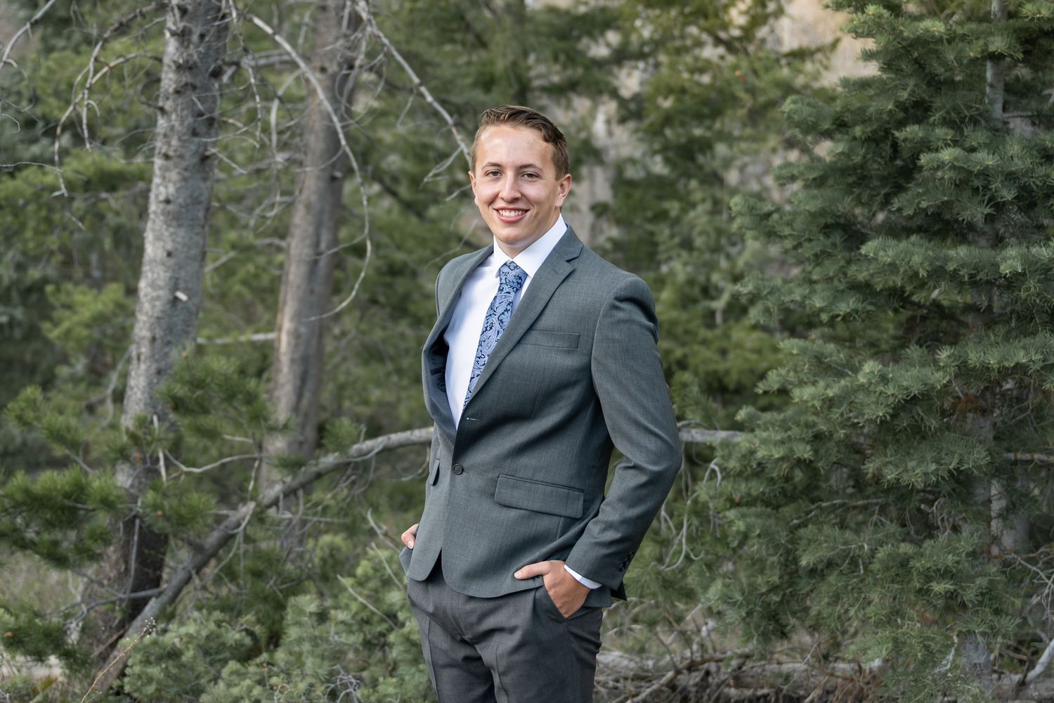 LDS missionary farewell portrait of a young man outdoors before beginning his mission, photographed in the canyon.