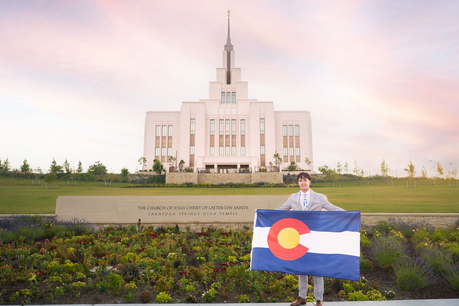 LDS temple at sunset creating a beautiful backdrop for missionary farewell and homecoming photography in Saratoga Springs, UT.