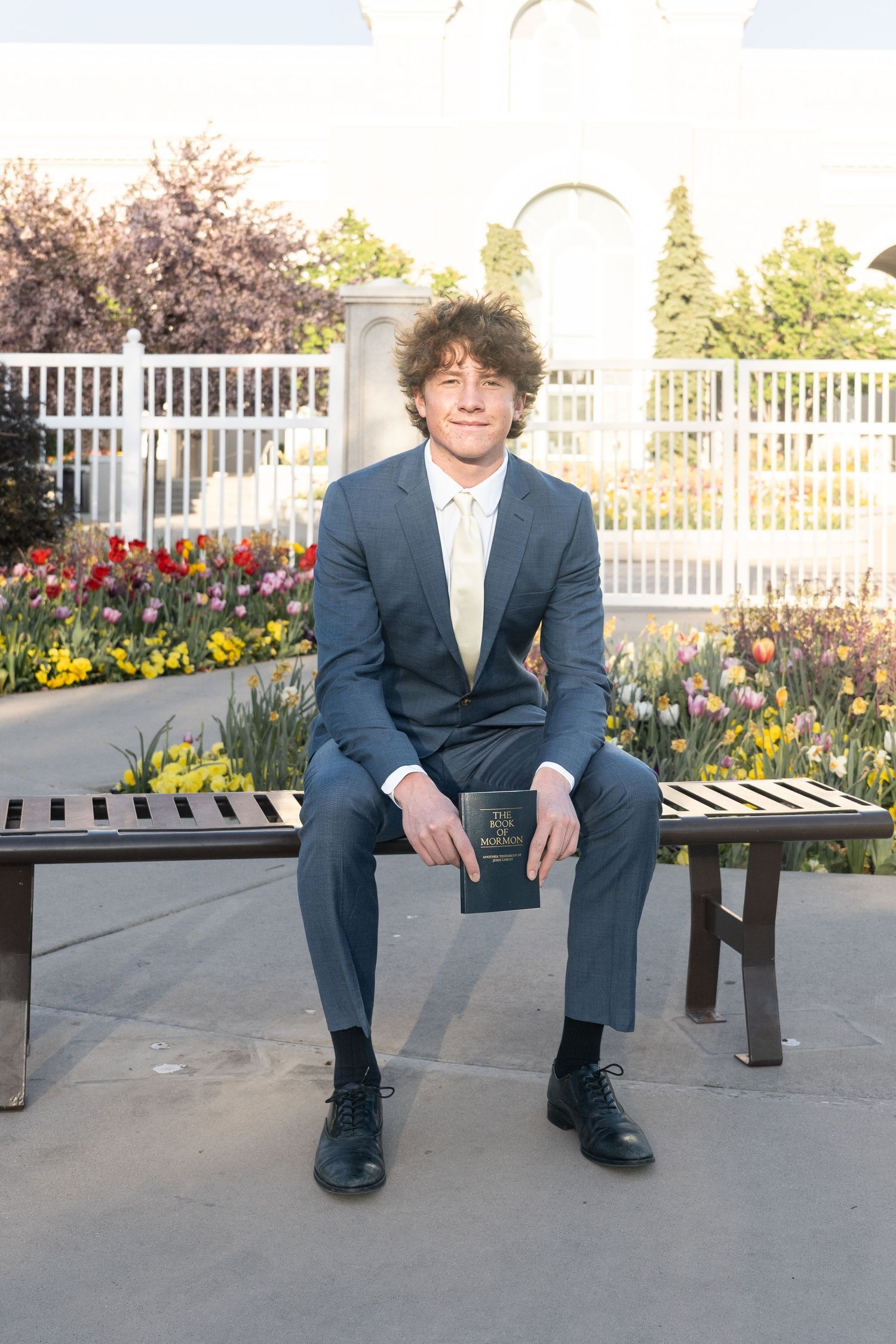 LDS missionary farewell portrait of a young man in a suit during an outdoor photography session in American Fork, UT.