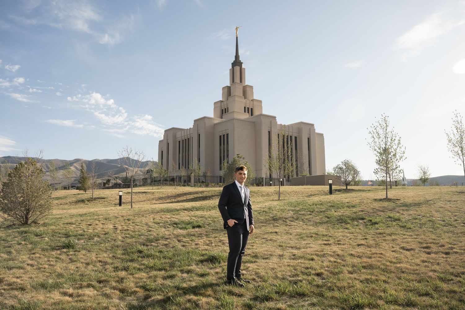 LDS missionary farewell portrait walking toward the temple during a golden hour photography session in Utah County.