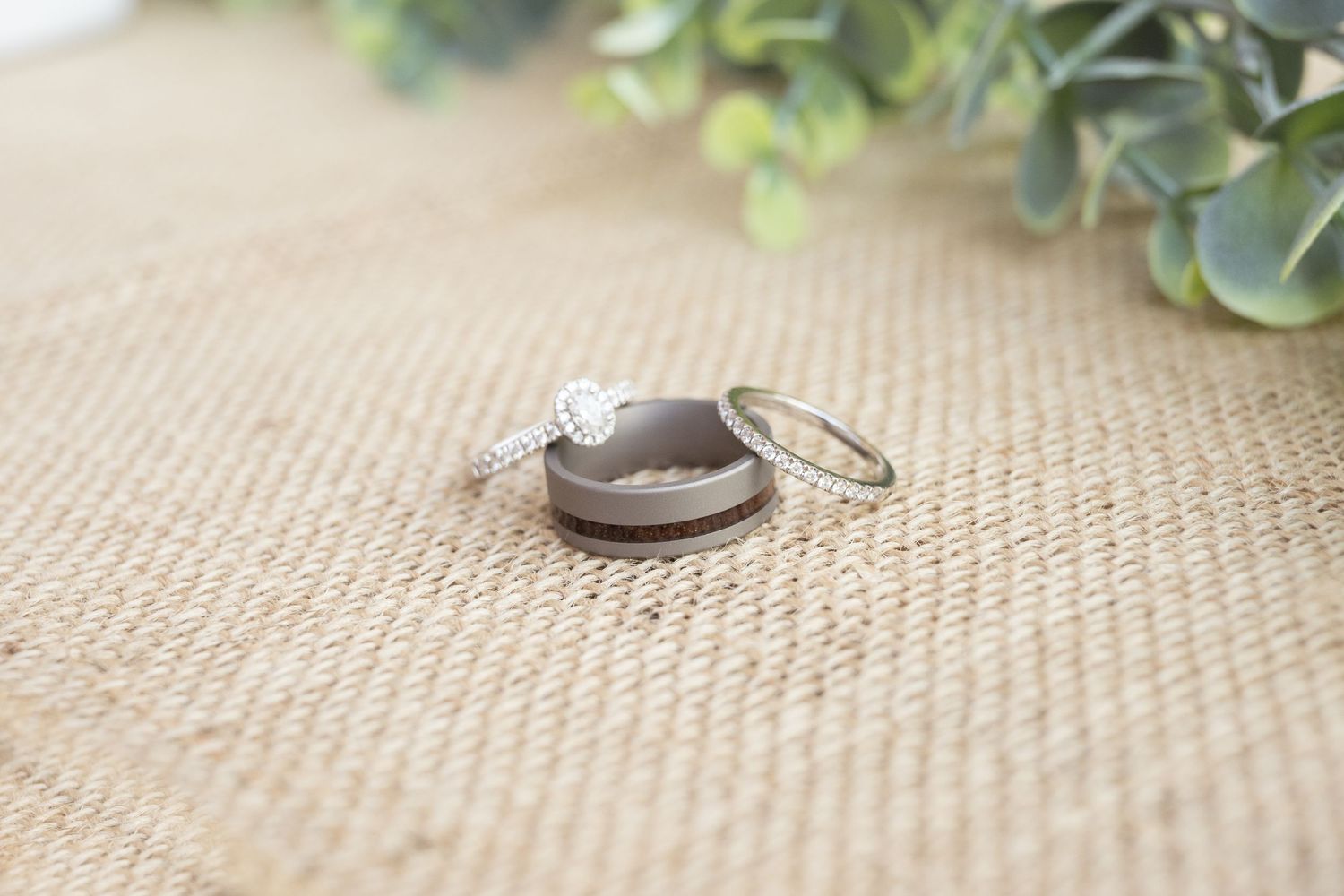 Elegant wedding ring detail showcasing the couple's rings before the ceremony.