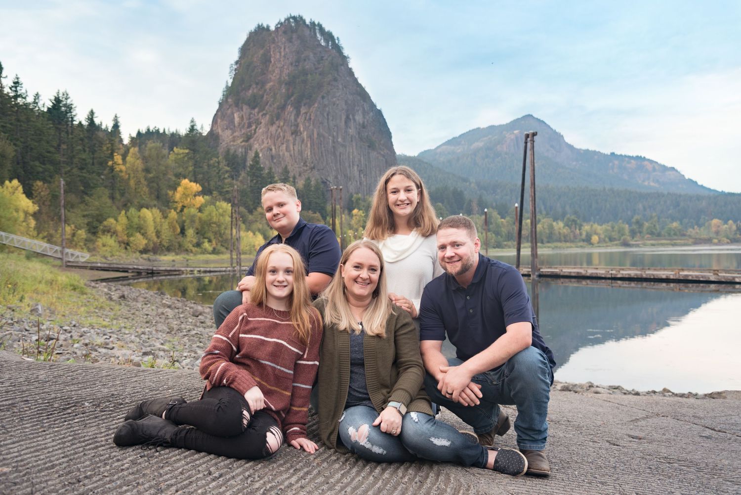 Natural light family portrait captured beside a scenic Beacon Rock.