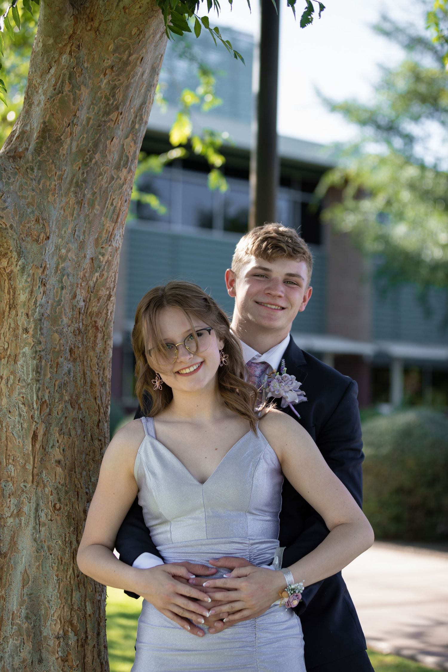 Engagement Session hugging each other while smiling.
