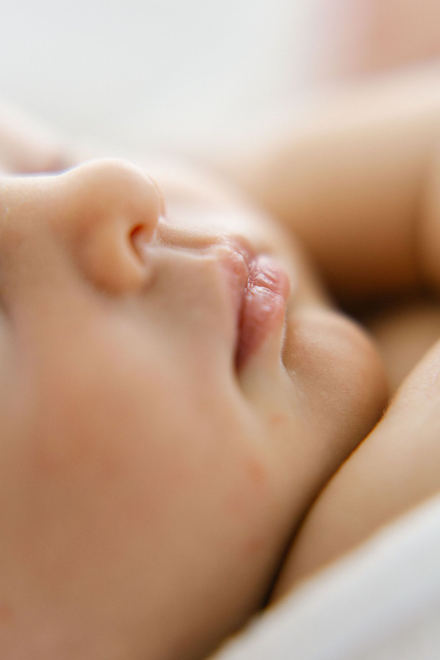 Close-up profile of peaceful sleeping baby.