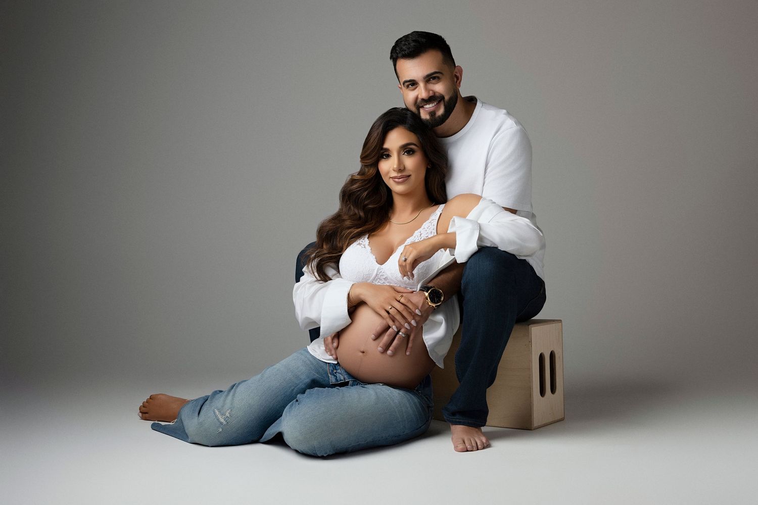 A photo of a pregnant woman and her husband