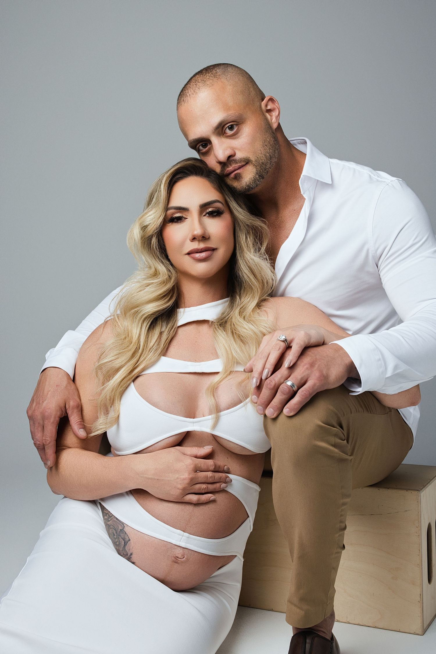 A photo of a pregnant woman and her husband