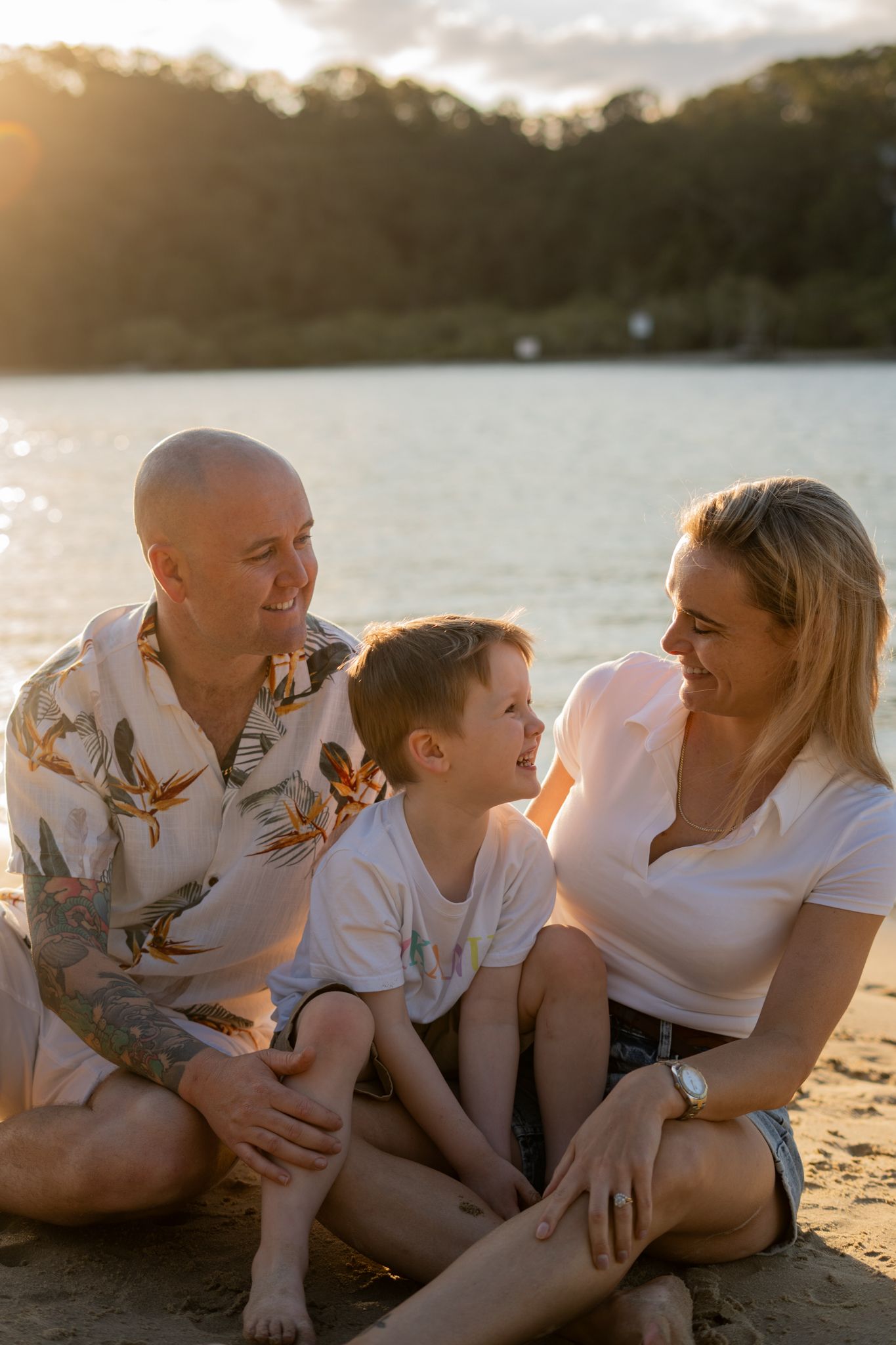 Family laughing together on the beach, unposed family portrait - Photos by Bailey Rose Gold Coast