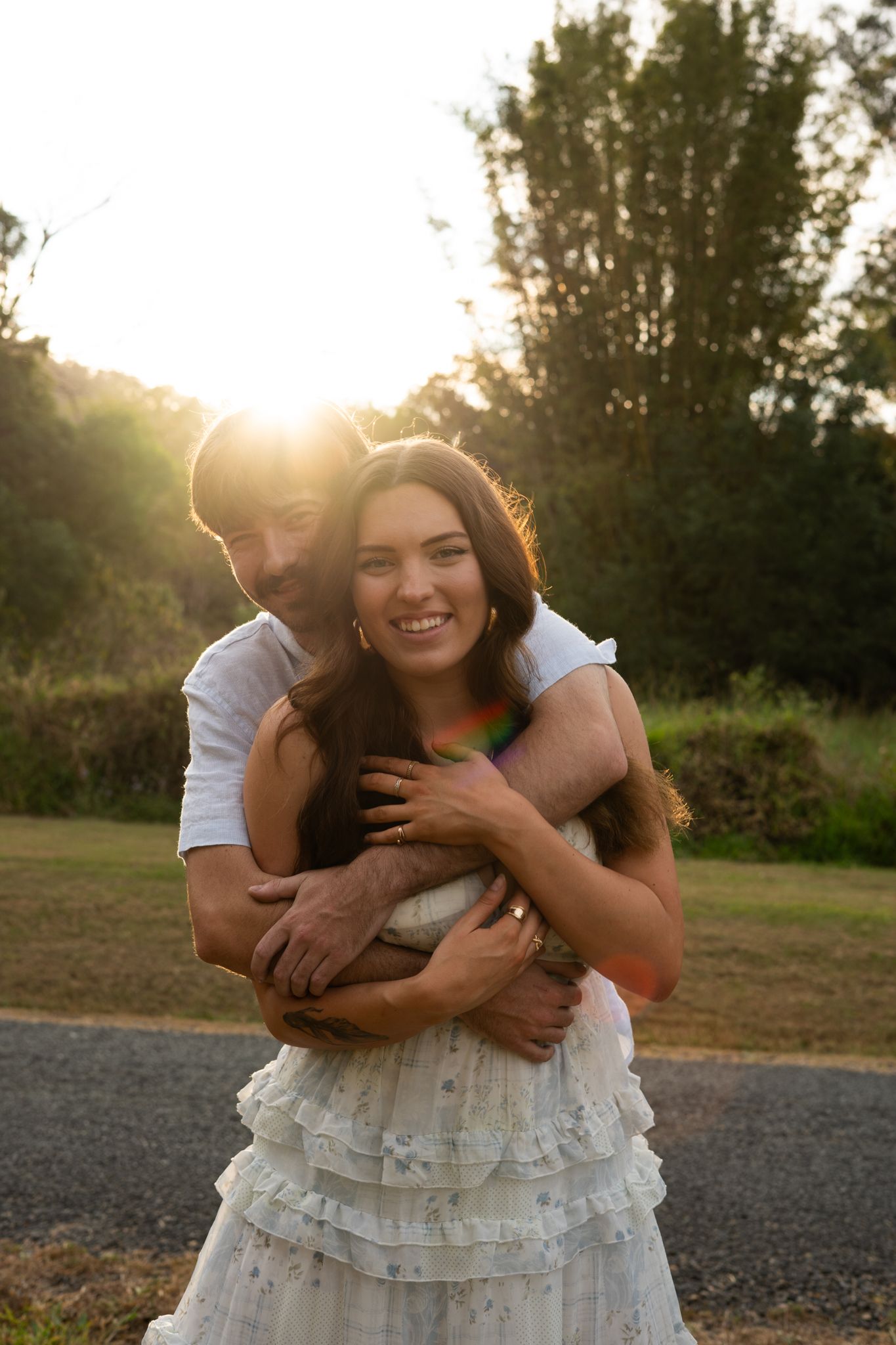 Couple at golden hour in open field — Photos by Bailey Rose Brisbane