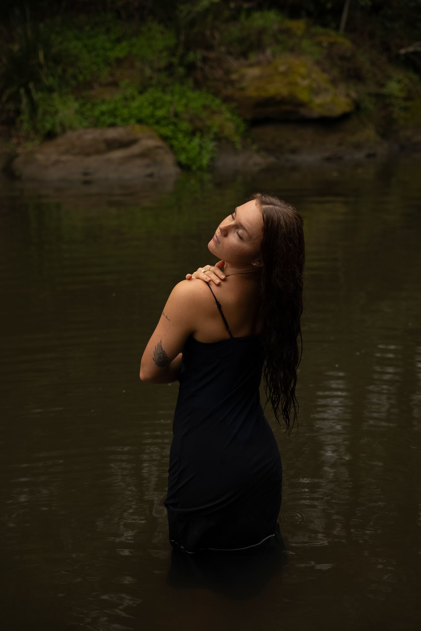 Photos by Bailey Rose — moody water portrait in dark river setting