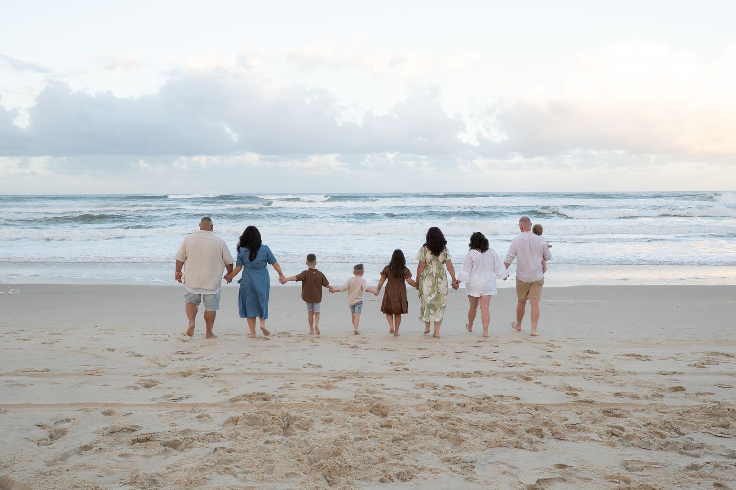 Extended Family walking together on beach at golden hour — Photos by Bailey Rose Gold Coast