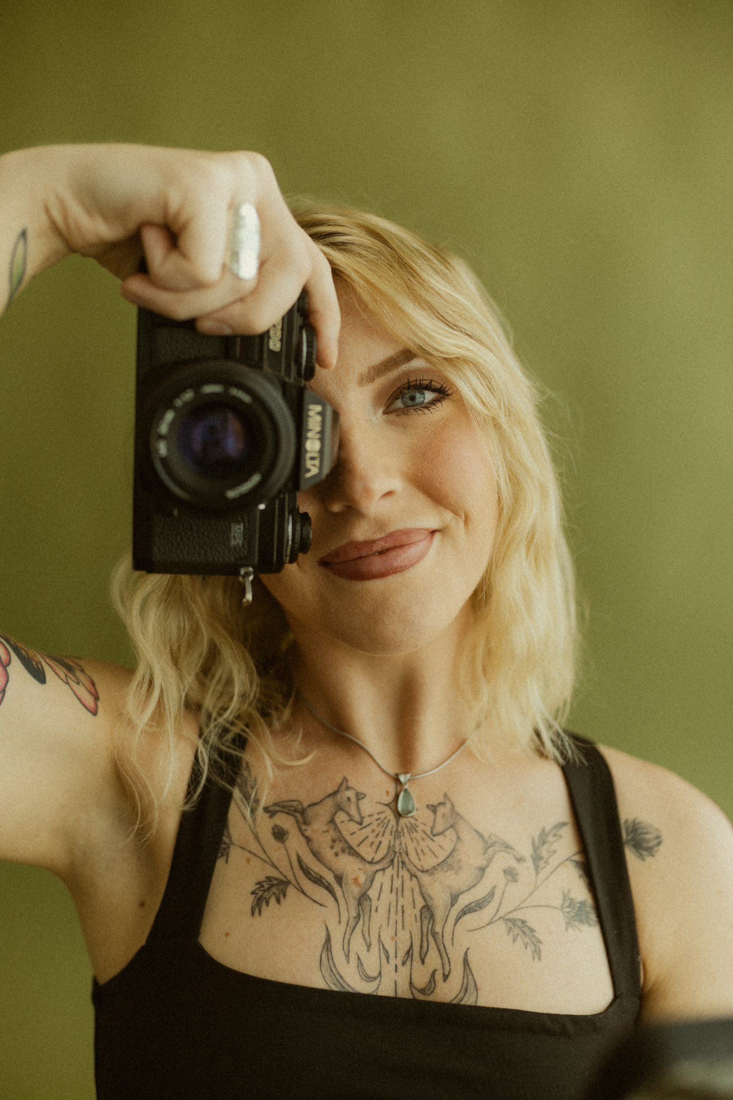 kind, fun, traveling photographer poses for headshots