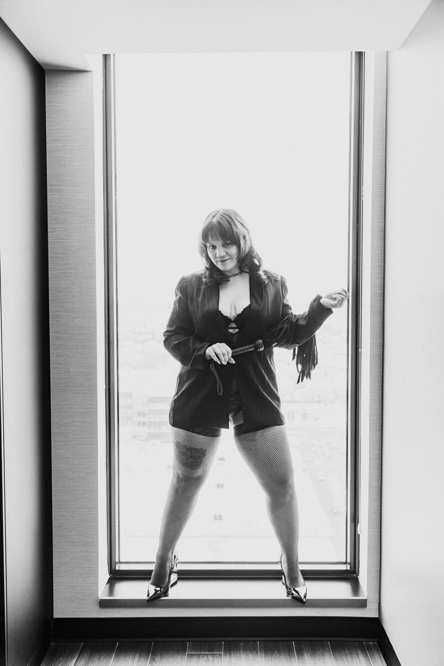 Silhouetted figure in dynamic poses against bright window backdrop.