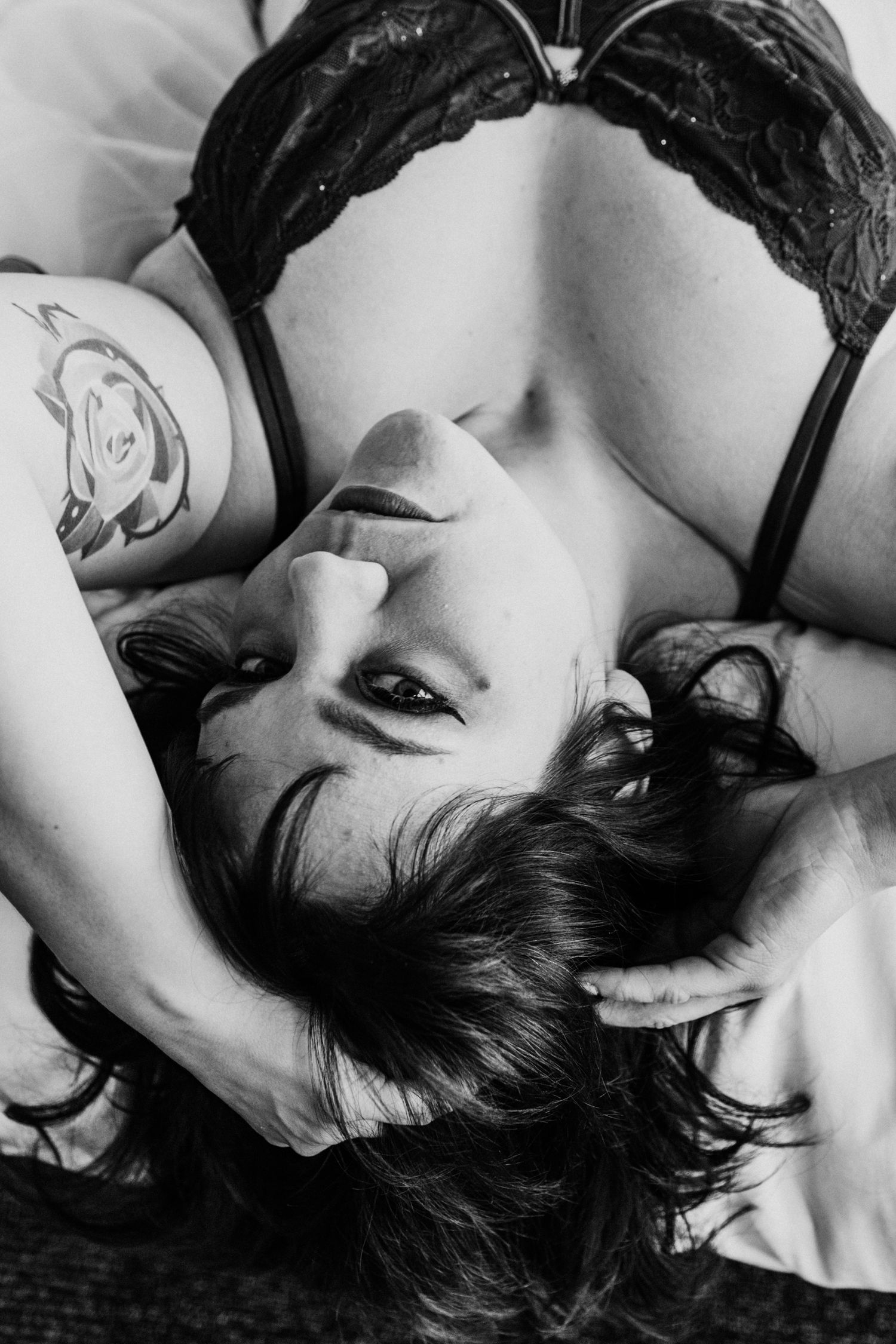High contrast black and white intimate portrait series with artistic angles.