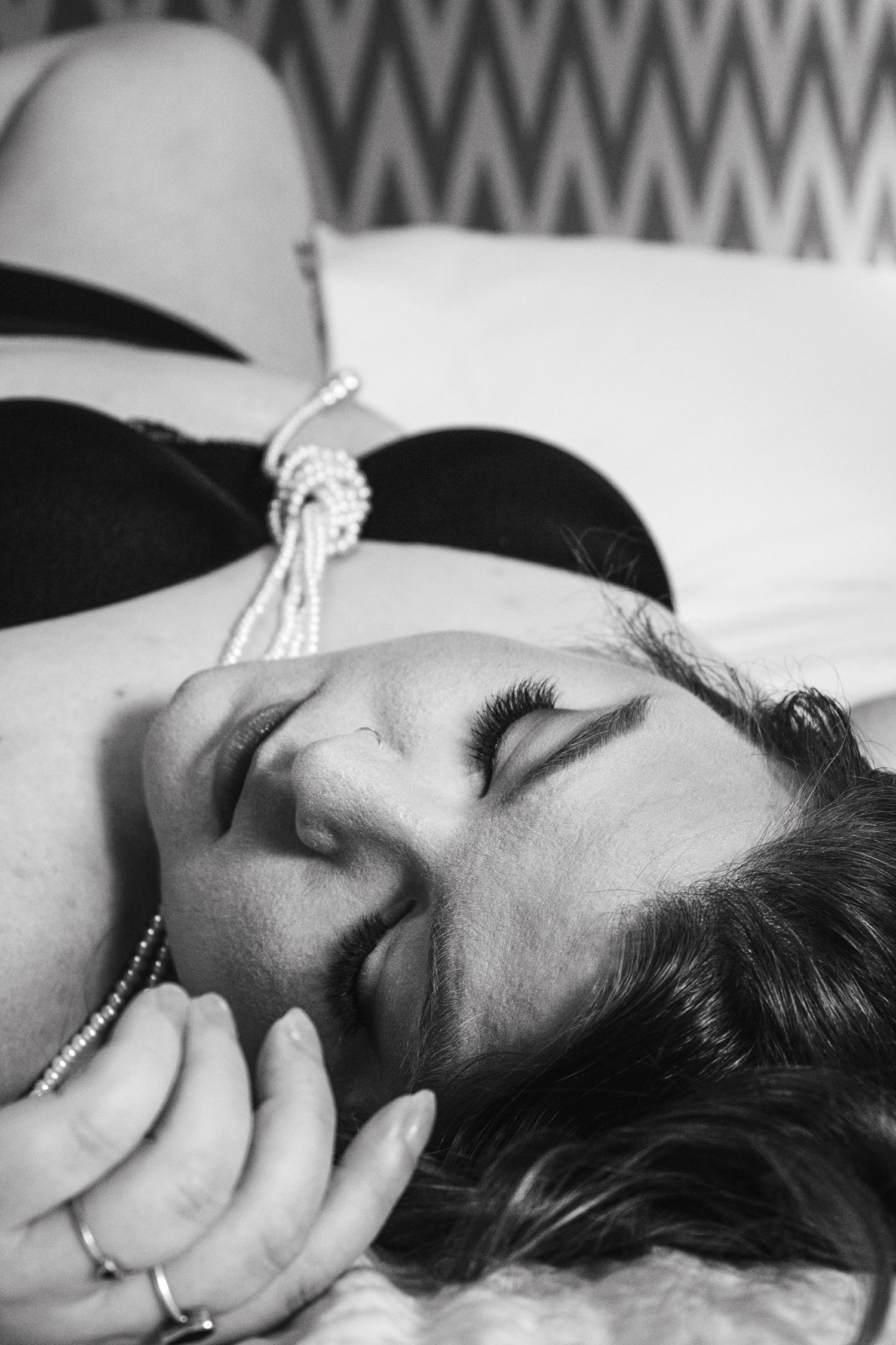Artistic black and white close-up portraits with jewelry details.